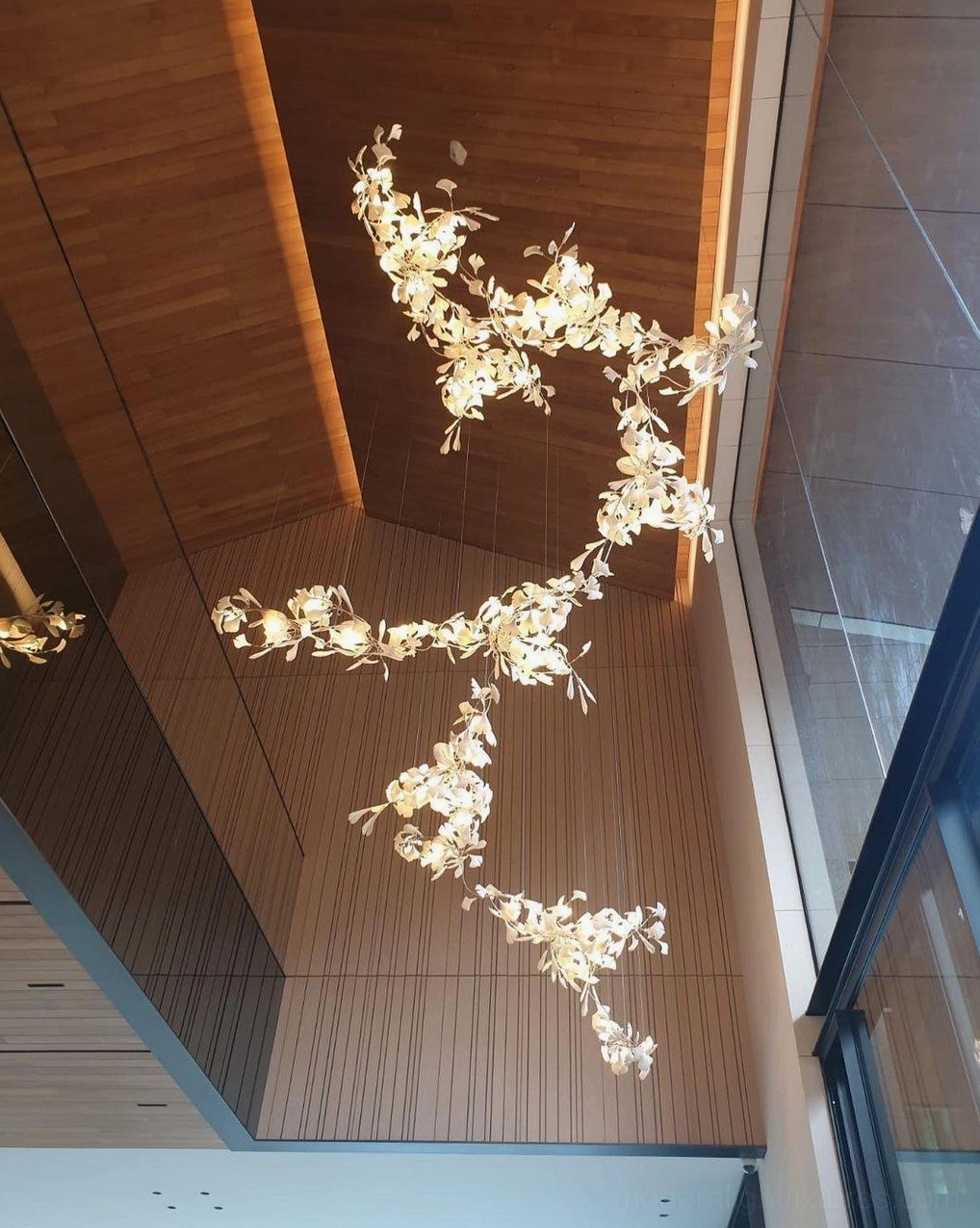 Ginkgo leaf pendant chandelier detail view of metal framework and ceramic leaf integration