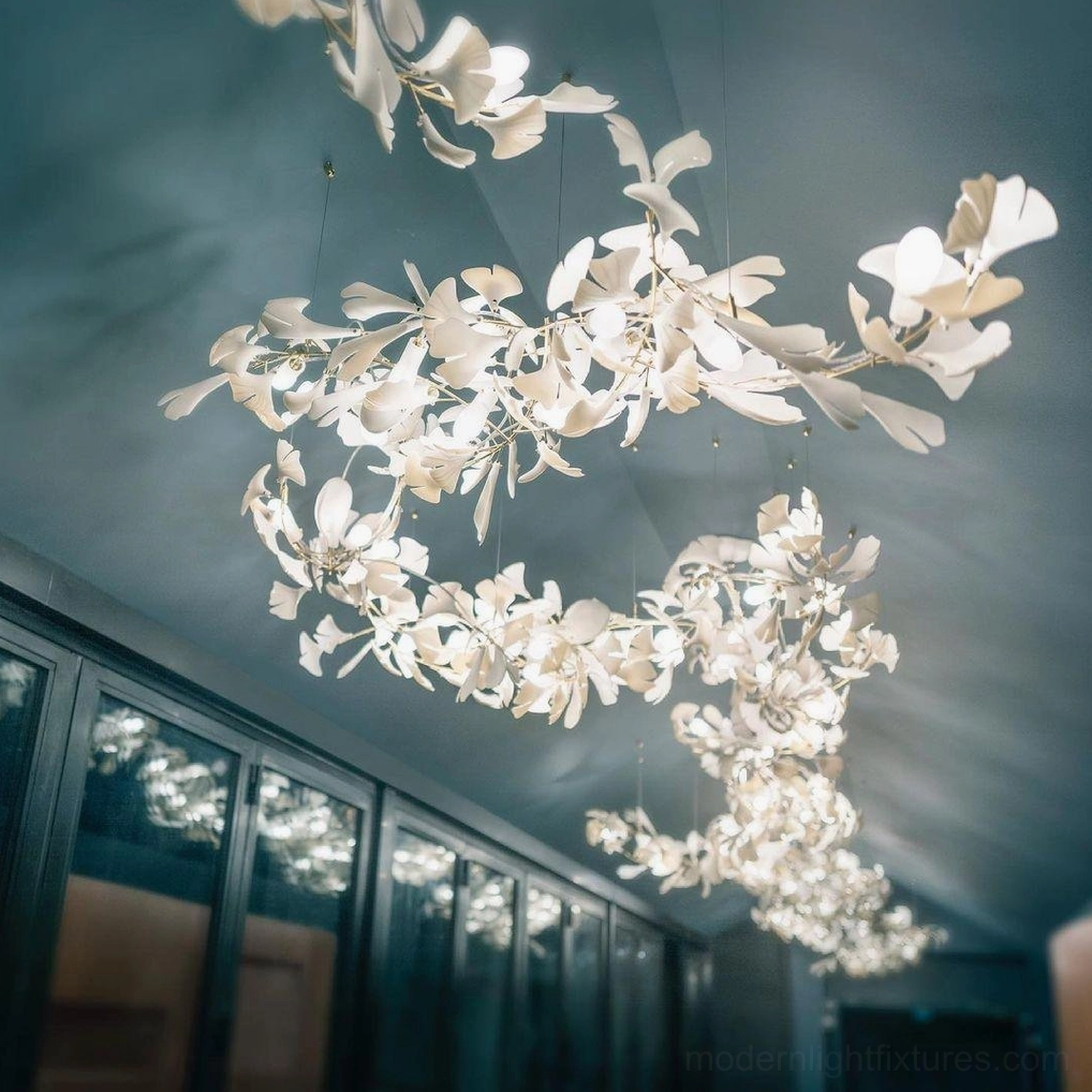 Ginkgo leaf pendant chandelier in art gallery and showroom demonstrating sculptural art installation qualities