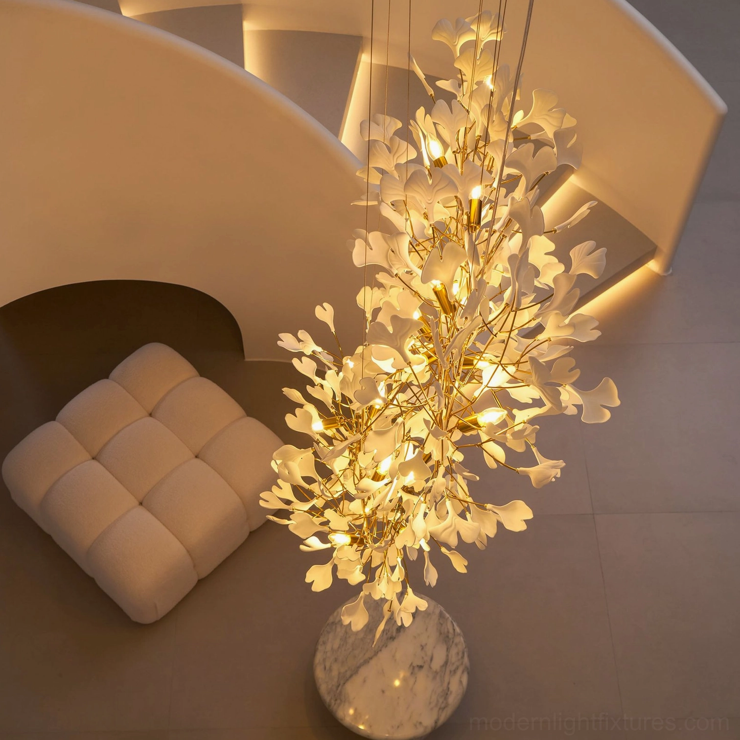 Ginkgo pendant chandelier showing natural light interaction with ceramic leaves