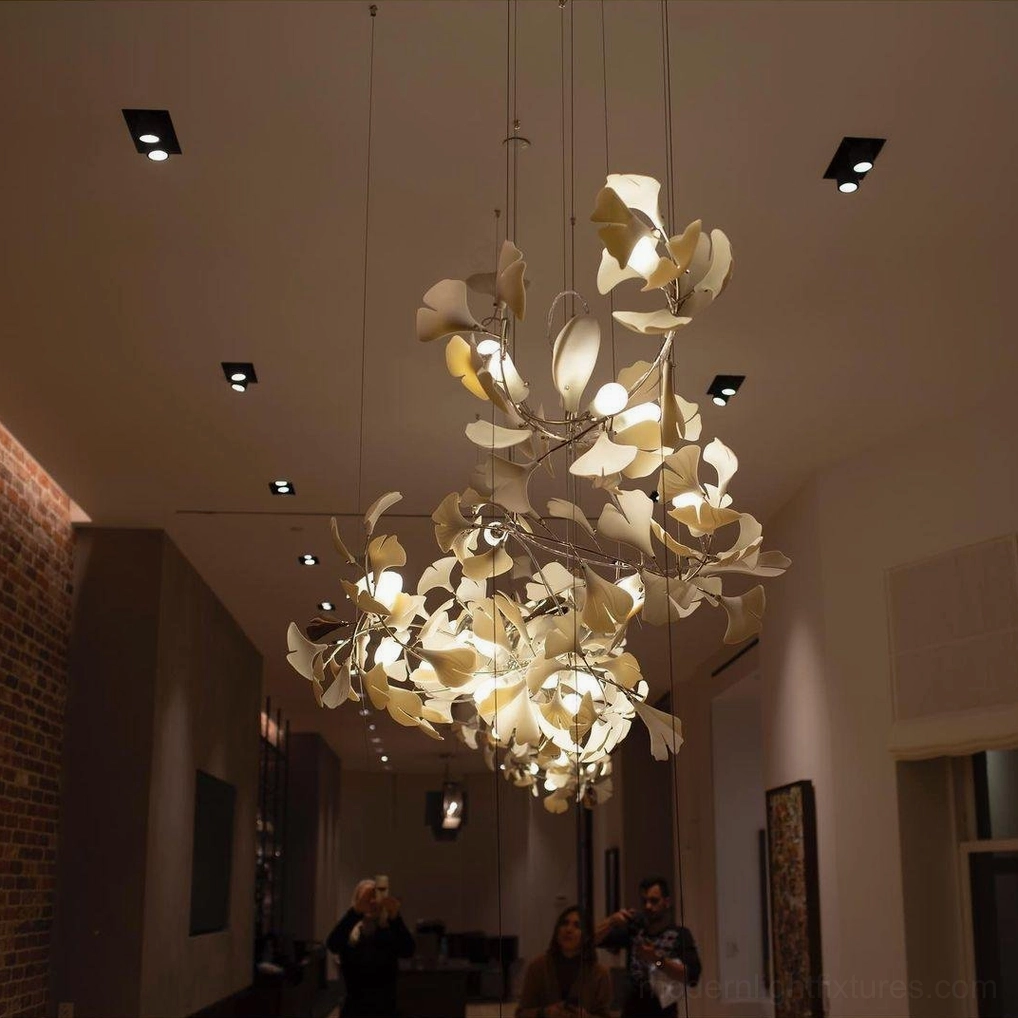 Modern ginkgo leaf chandelier in luxury maximalist interior making dramatic artistic statement
