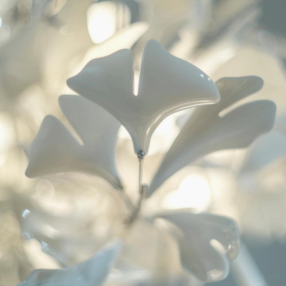 Ginkgo leaf pendant chandelier detail showing metal finish options and ceramic contrast