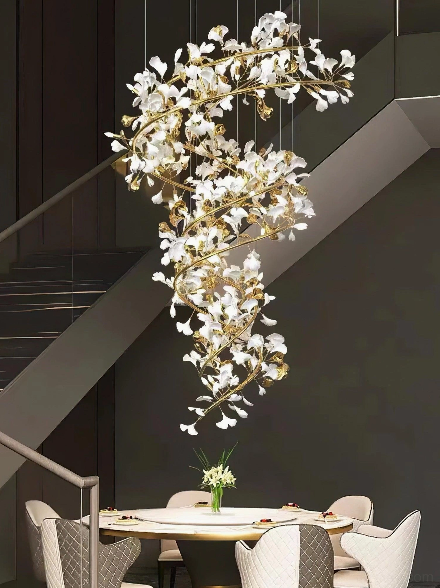 Close-up detail of ginkgo pendant chandelier showing metal frame branch flexibility