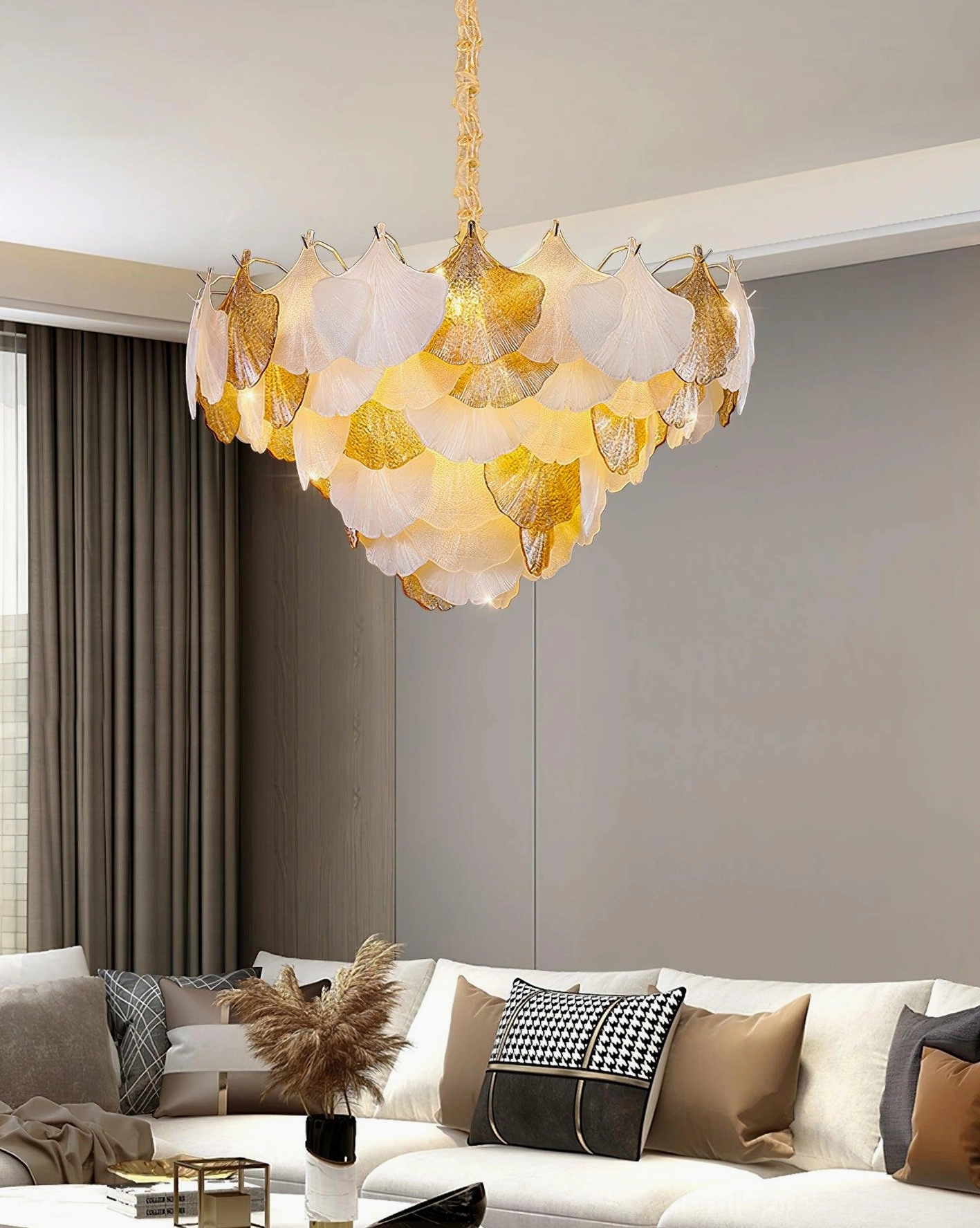 Ginkgo chandelier installed in modern minimalist living room with sofa, demonstrating contemporary home decor compatibility