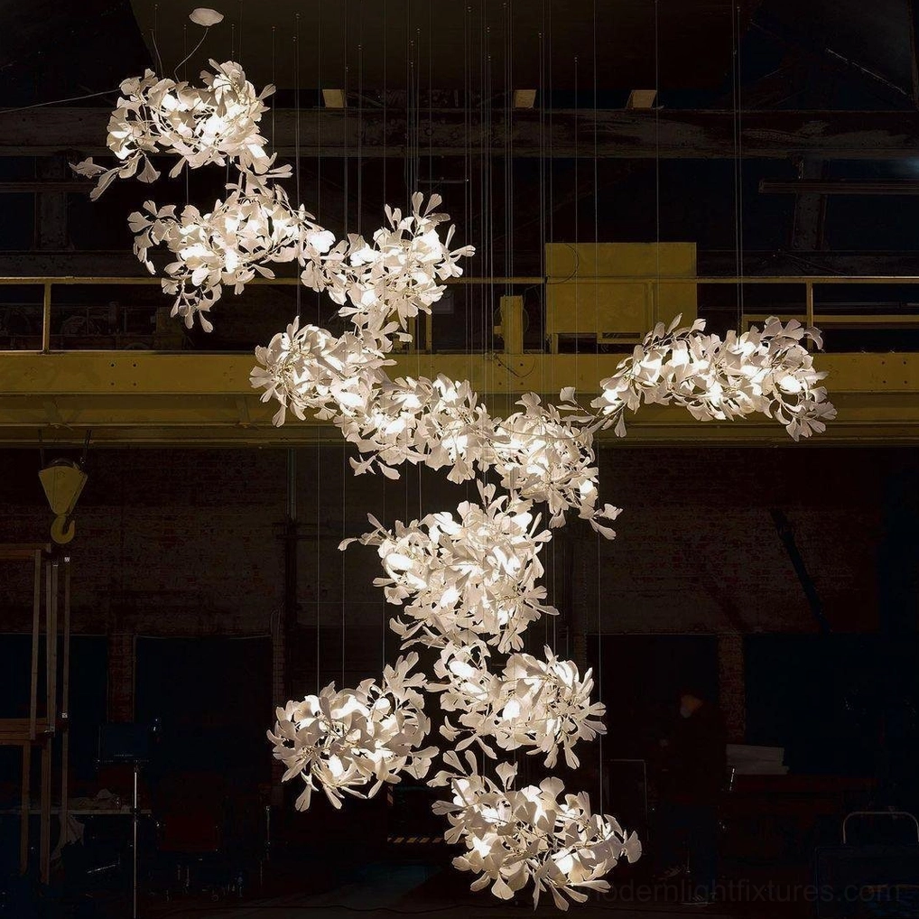 Ginkgo leaf chandelier with brushed nickel finish in minimalist modern interior design space