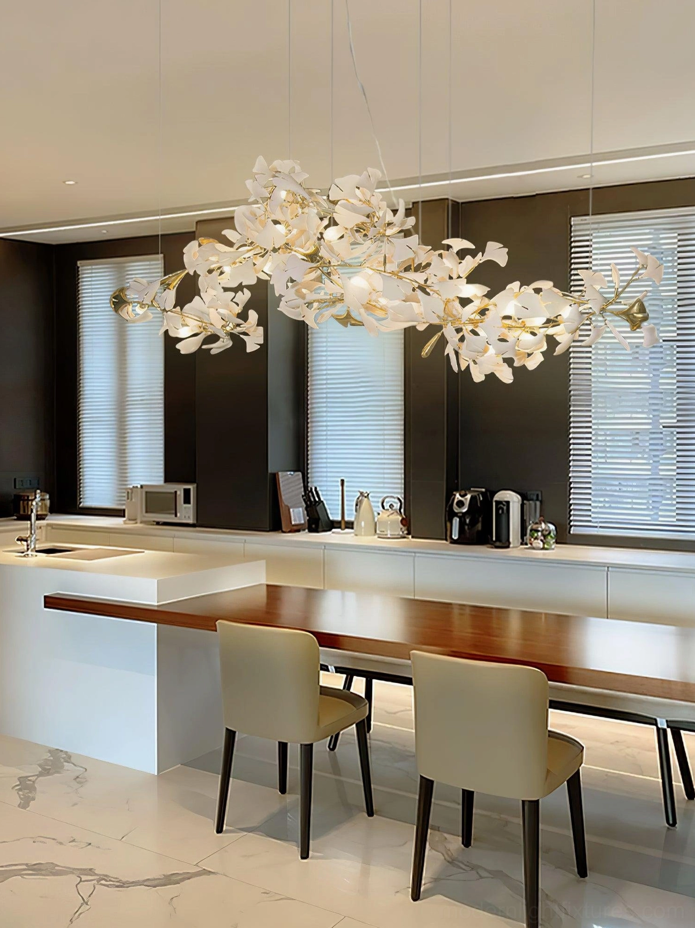 Ginkgo leaf linear chandelier side angle view showing sculptural metal branches and ceramic leaf details