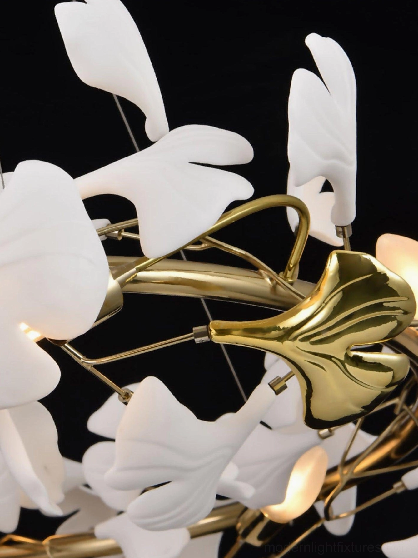 Multiple ginkgo leaf chandelier size options displayed side by side showing scale variations from small to extra large
