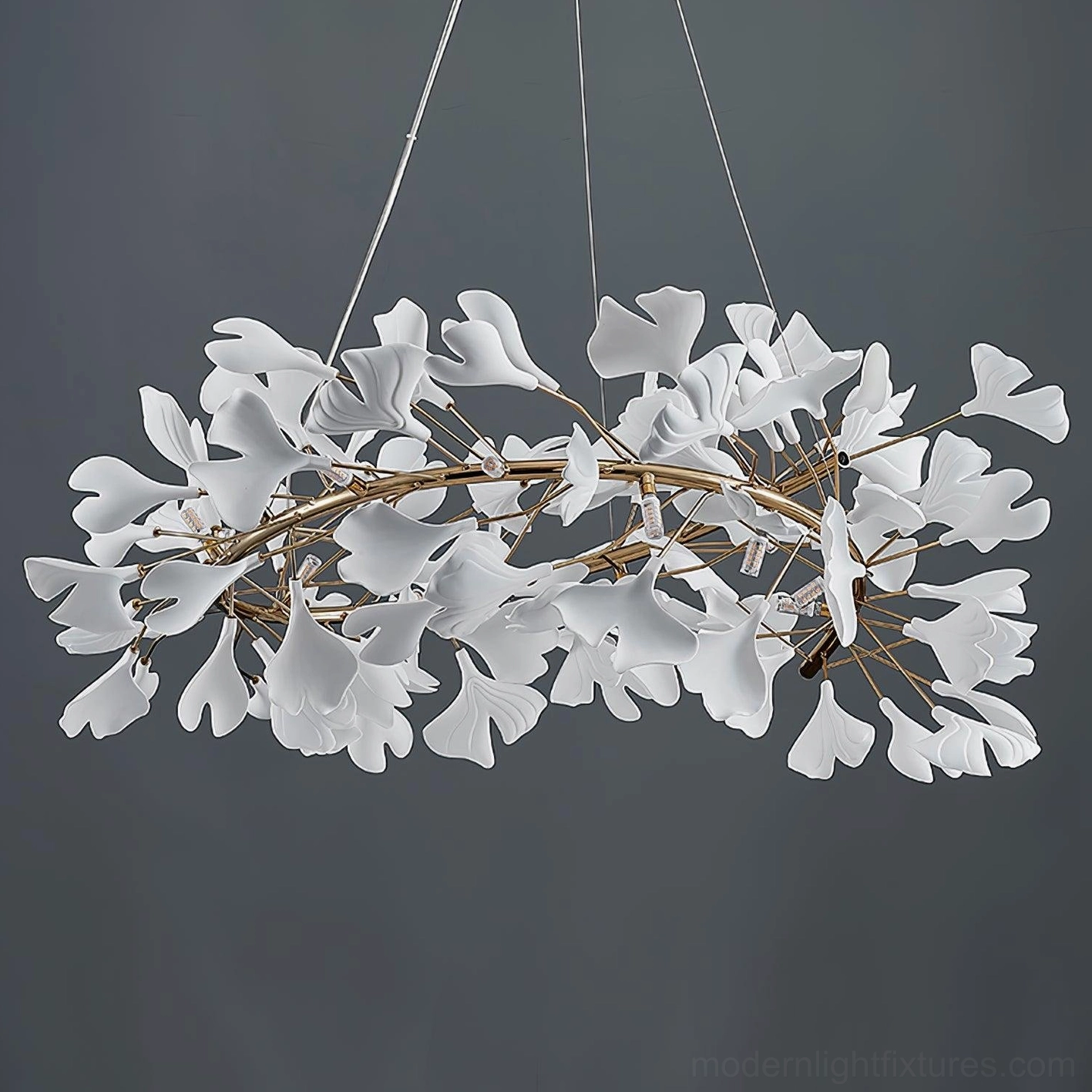 Artistic ginkgo leaf chandelier showing nature-inspired ceramic design and metal framework