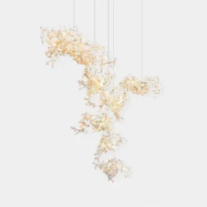 Ginkgo leaf chandelier front view showing off-white ceramic leaves on metal branches against pure white background