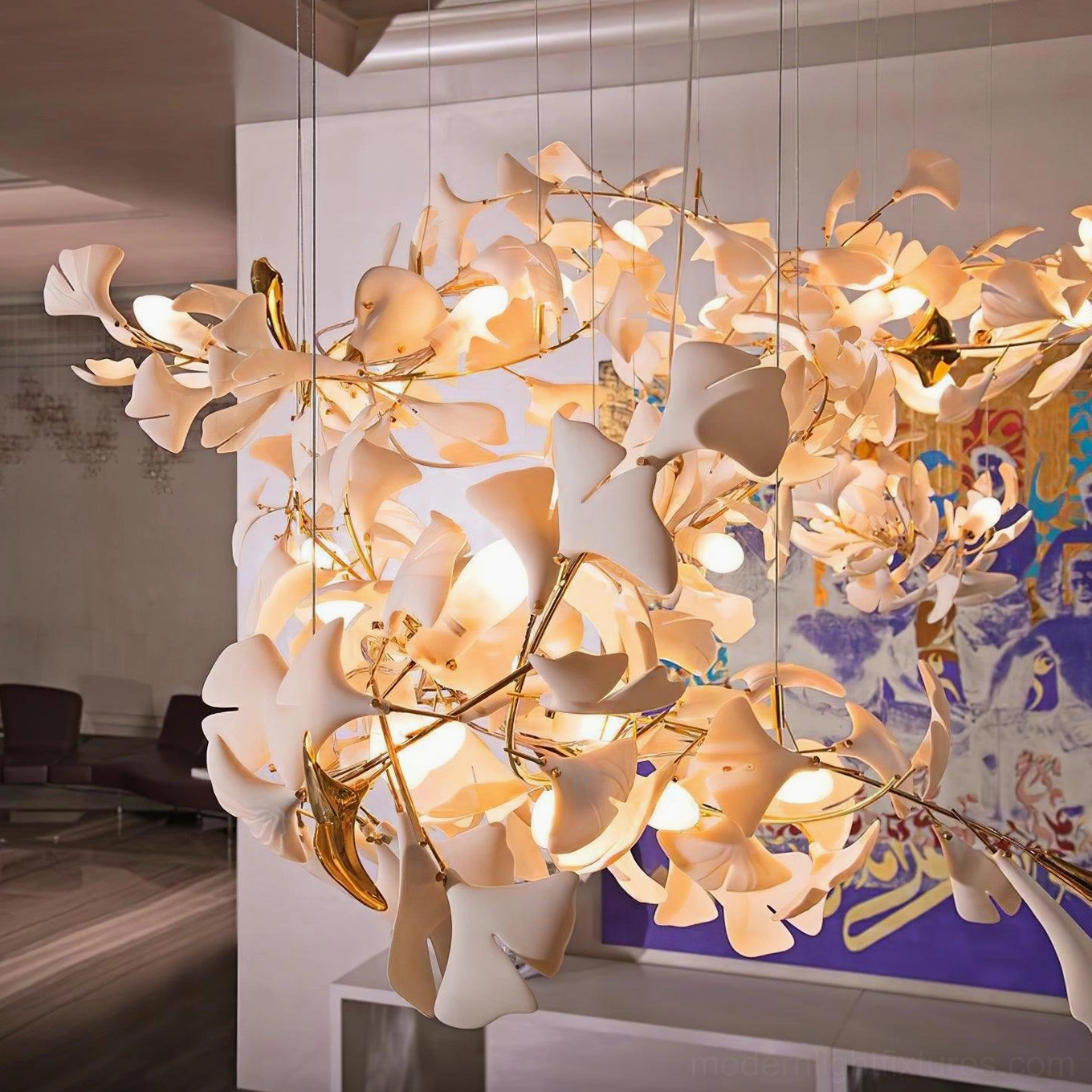 Ginkgo leaf chandelier gold finish option showing warm metallic frame with white ceramic leaves