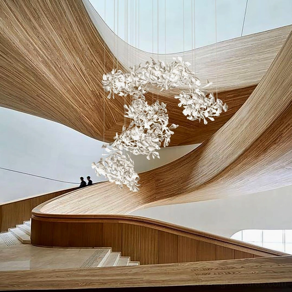 Ginkgo leaf chandelier in modern living space with asymmetrical arrangement and natural botanical aesthetic