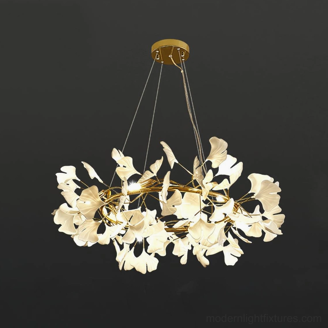Ginkgo leaf pendant chandelier O style with off-white ceramic leaves and minimalist gold frame on dark background
