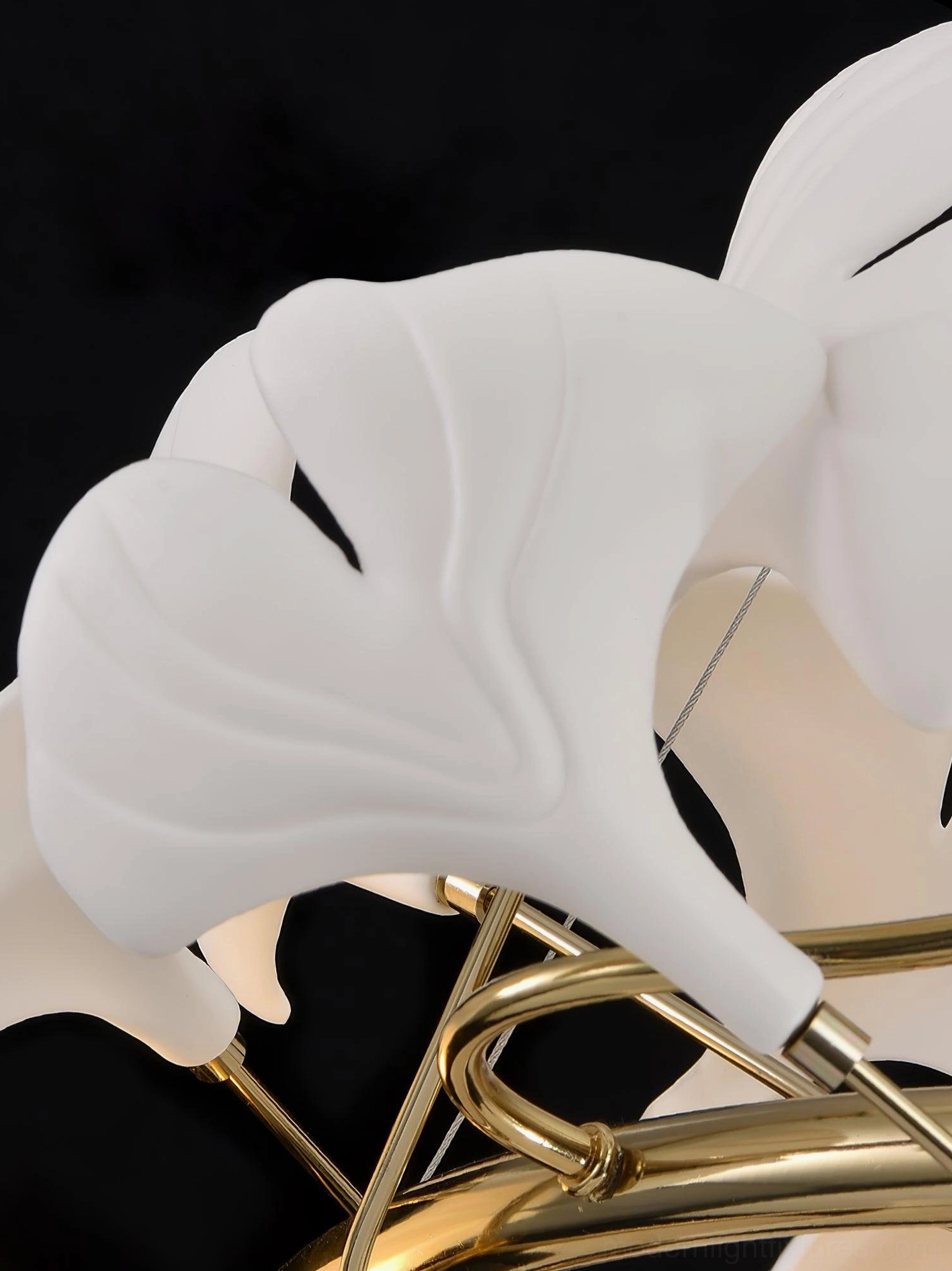 Ginkgo leaf chandelier design detail emphasizing organic fan-shaped leaf elements and contemporary spiral vine arrangement