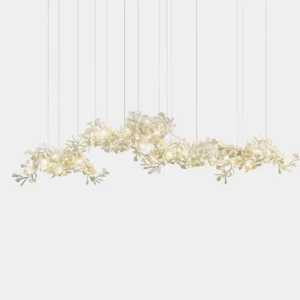 Ginkgo leaf pendant chandelier with asymmetrical cream-colored ceramic leaves arranged in sculptural formation, overhead studio view
