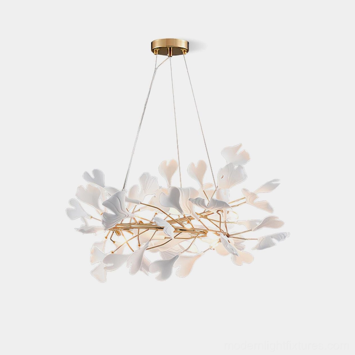 Ginkgo leaf chandelier U-style with white ceramic leaves and gold metal frame, front studio view