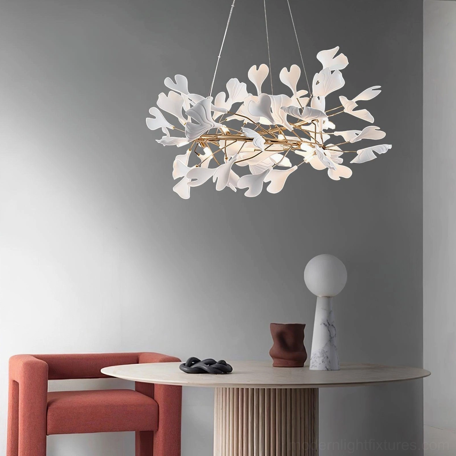 Ginkgo leaf chandelier U-shape design in light luxury lounge with white ceramic leaf details