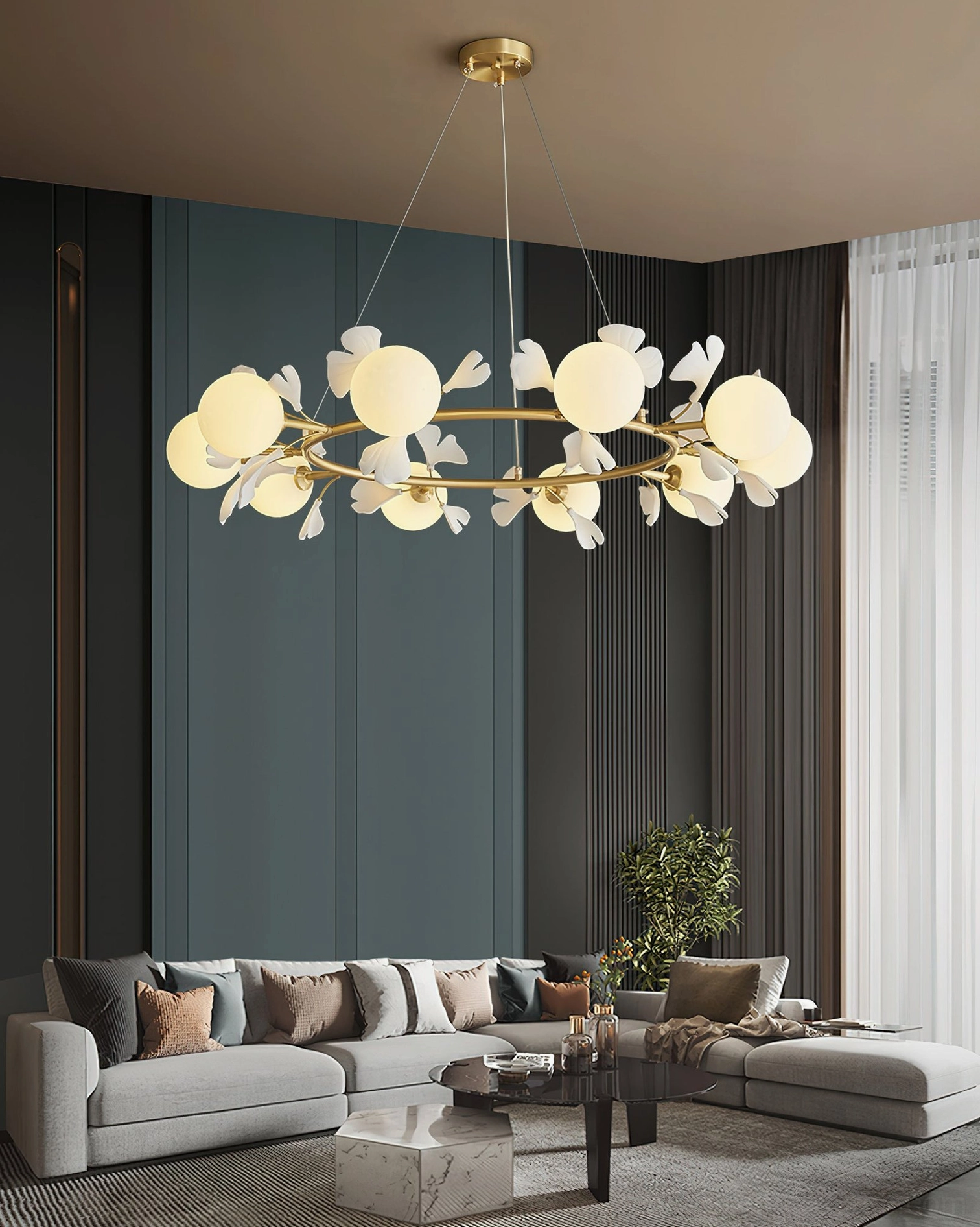 Modern ginkgo chandelier with warm glowing light in contemporary interior