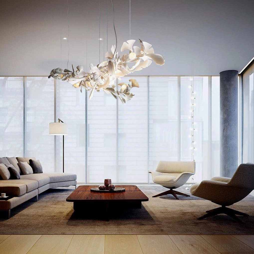 Ginkgo leaf chandelier white body finish with white ceramic leaves aesthetic in neutral interior space
