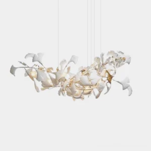 Ginkgo leaf chandelier with white ceramic leaves and adjustable metal branches on plain studio background, front view modern pendant light fixture