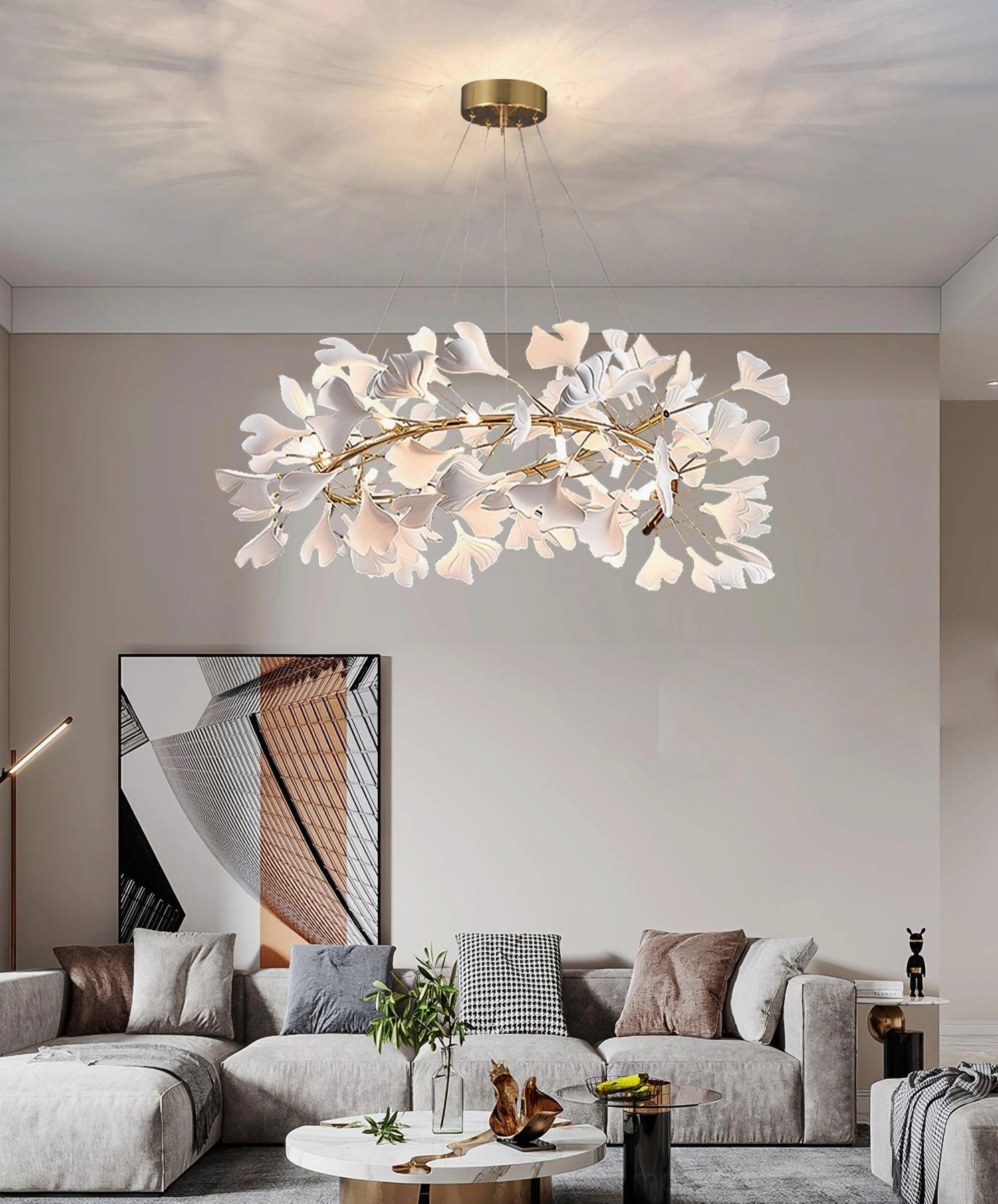Contemporary ginkgo leaf chandelier in light luxury interior with white ceramic leaves