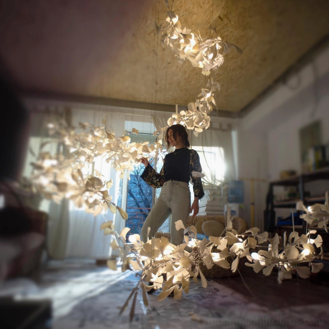 Modern ginkgo leaf pendant chandelier with fan-shaped ceramic leaves inspired by botanical artistry