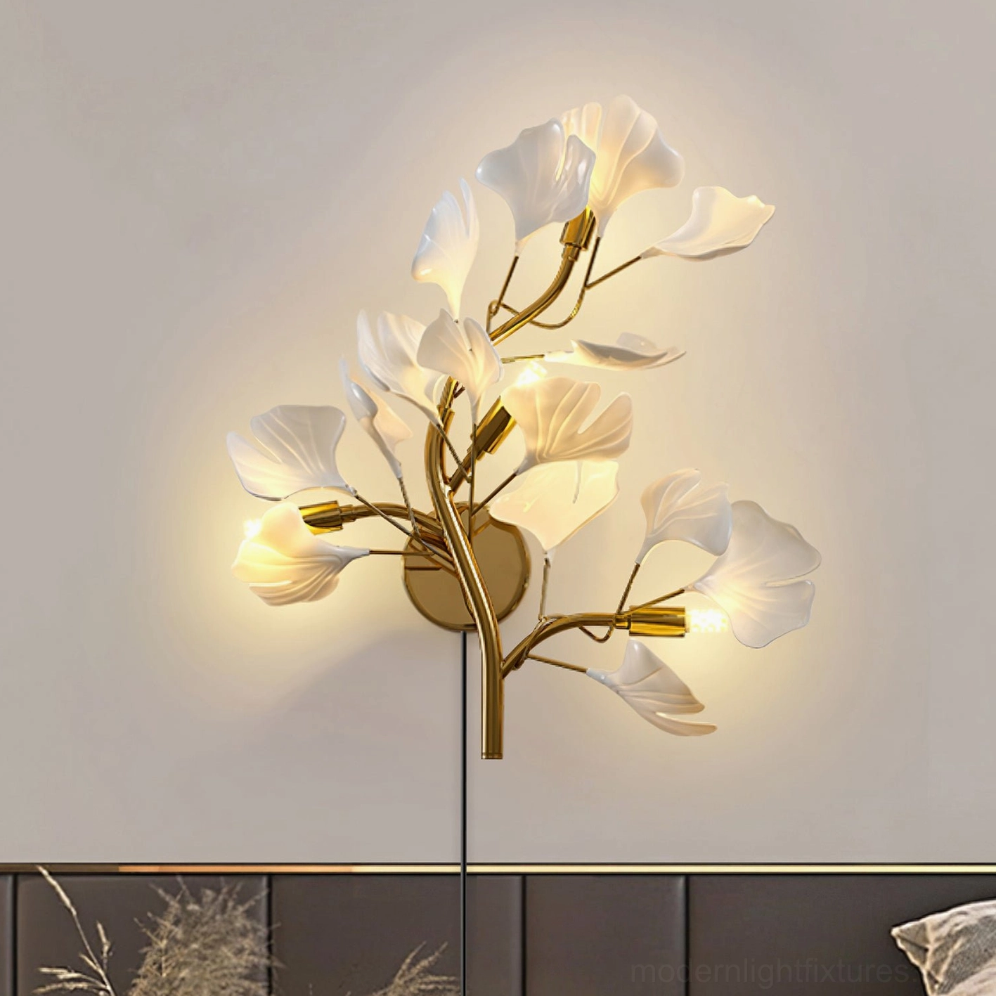 Ginkgo leaf plug-in wall sconce mounted in sophisticated interior showing architectural lighting design