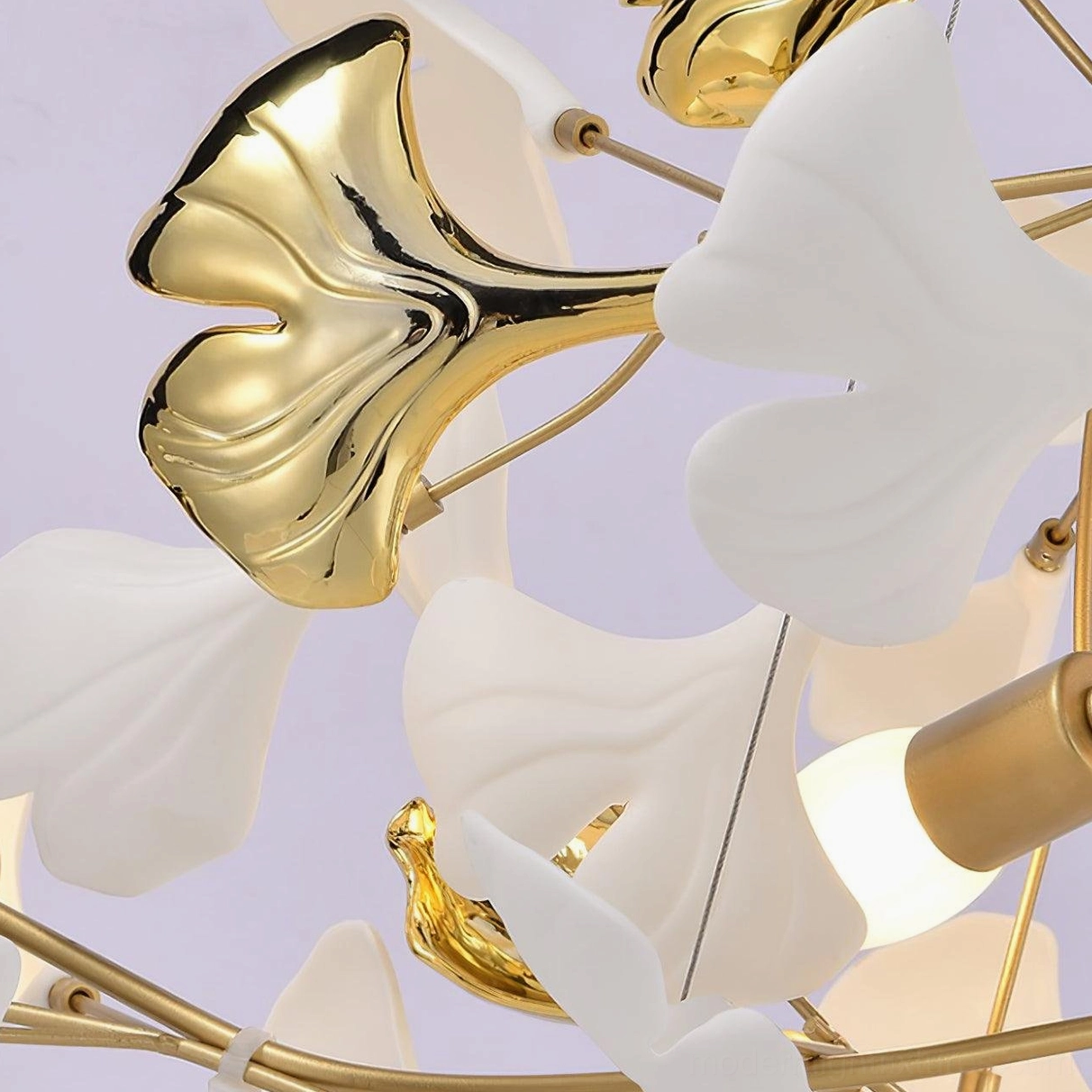 Contemporary ginkgo leaf pendant chandelier - front facing view with white ceramic leaves and metal frame