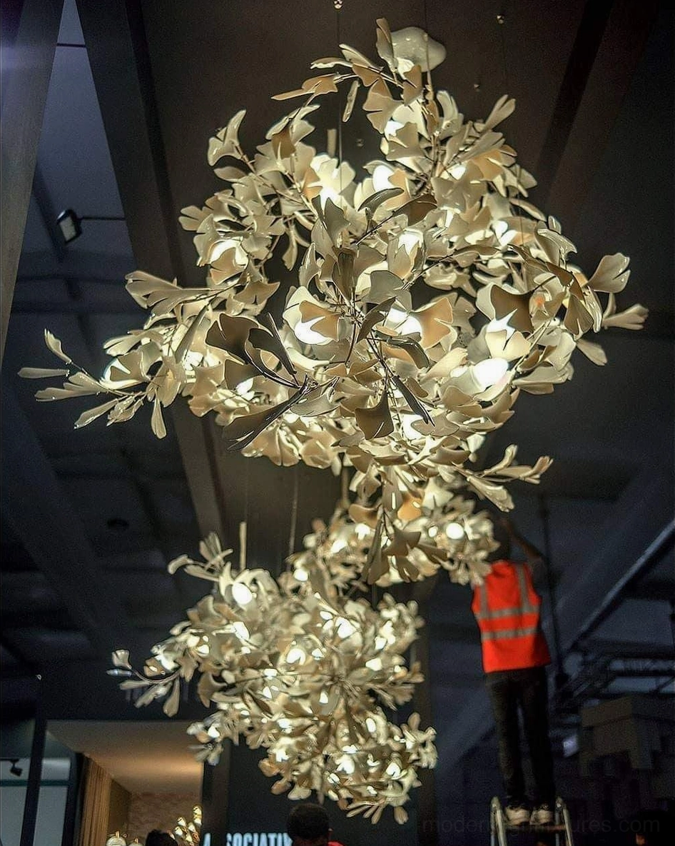 Ginkgo leaf chandelier with white ceramic leaf option featuring smooth integrated finish