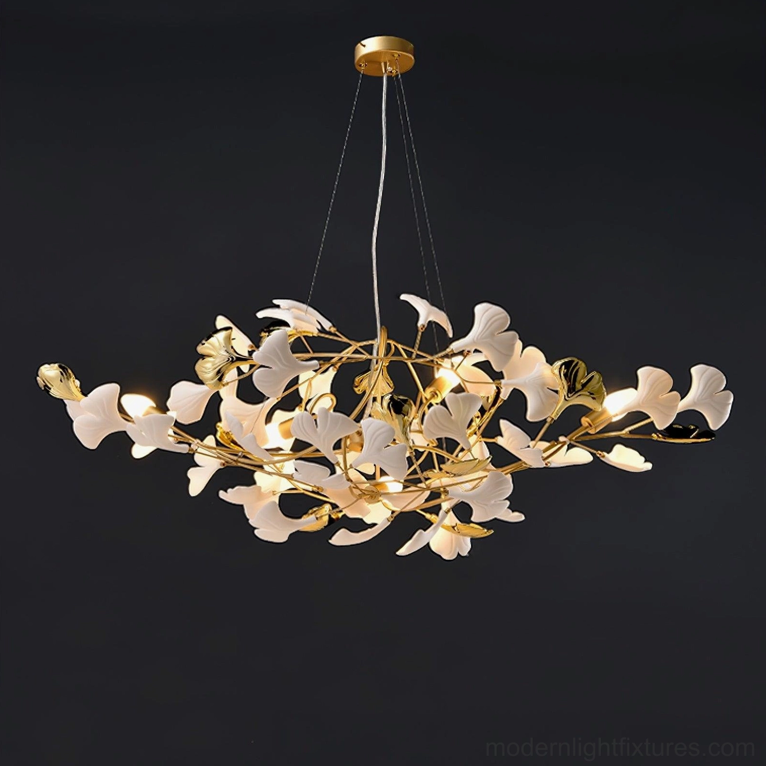 Ginkgo leaf pendant light - sculptural modern chandelier with natural botanical-inspired design and metal accents