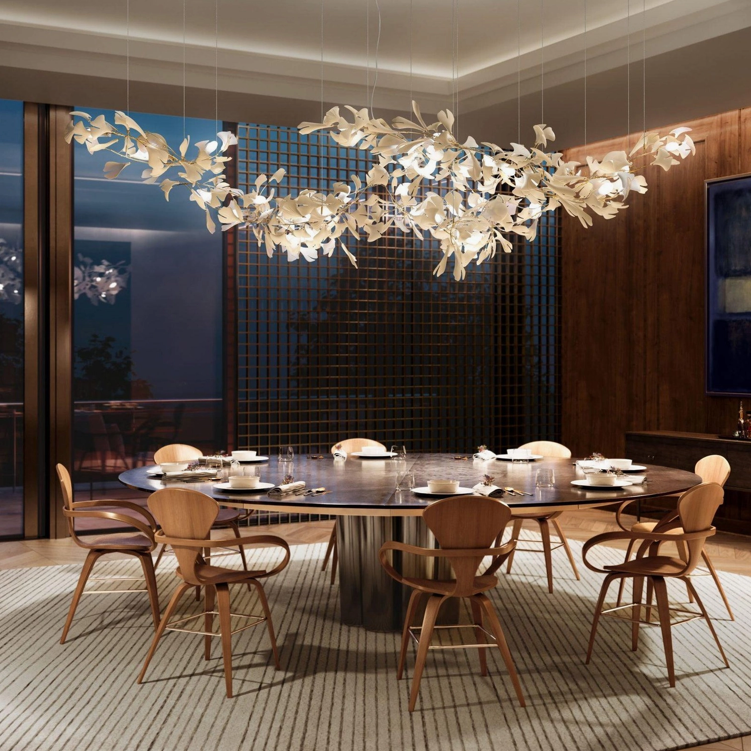 Ginkgo leaf chandelier showing warm light diffusion through ceramic leaves and metal framework