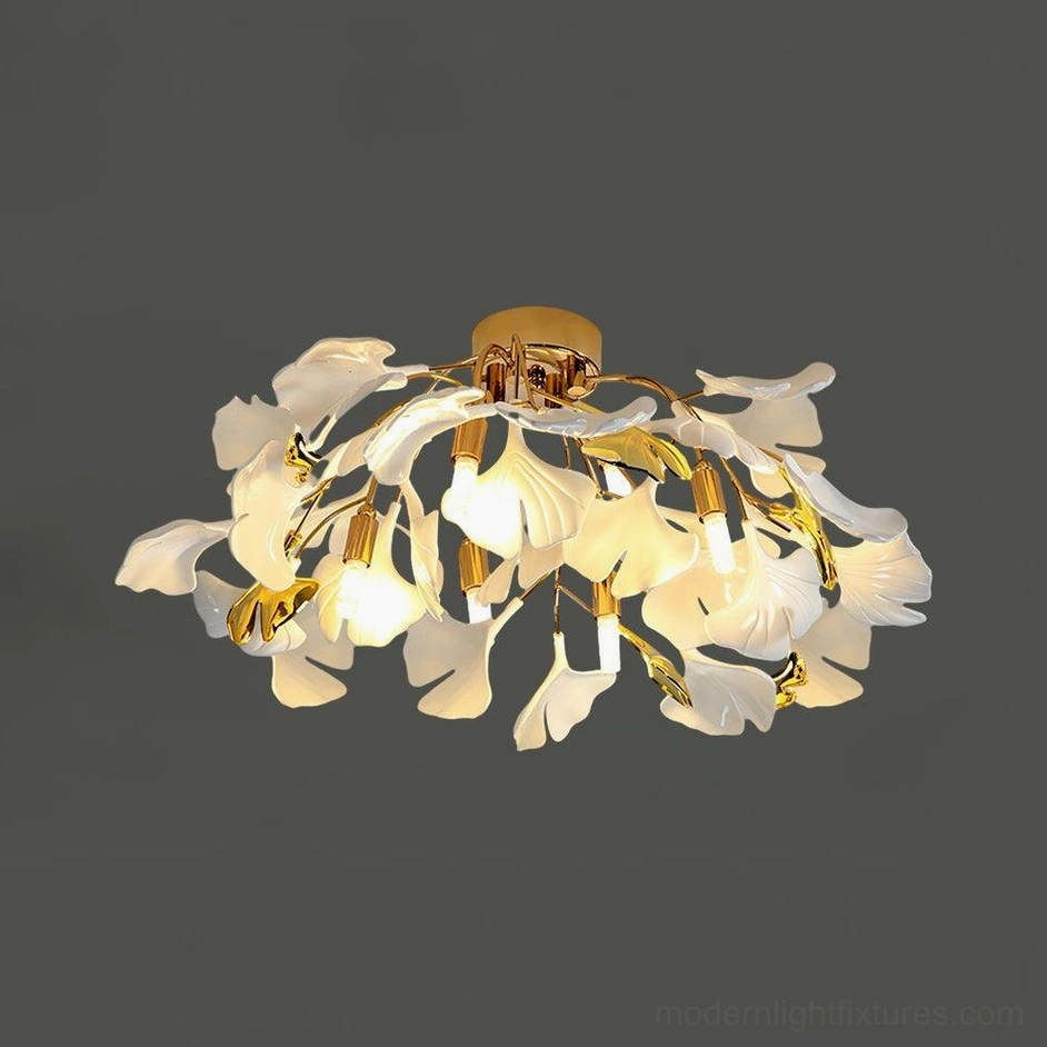 Ginkgo Valla modern ceiling light 62cm large size with gold metal frame and multiple white ceramic leaf elements
