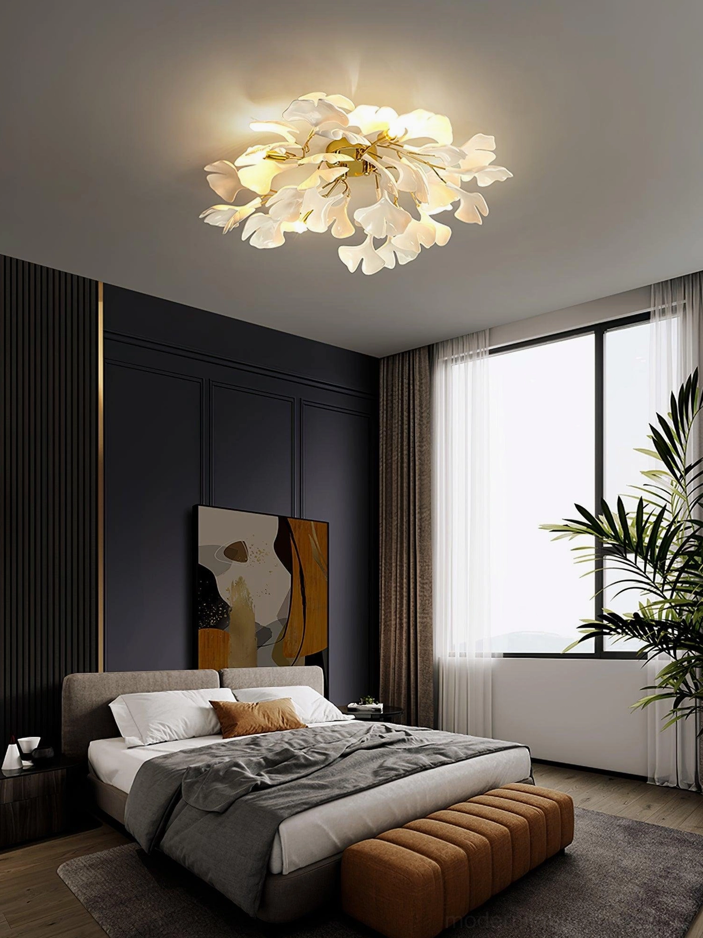 Ginkgo Valla modern ceiling light with white ceramic leaves and metal housing creating contemporary design aesthetic