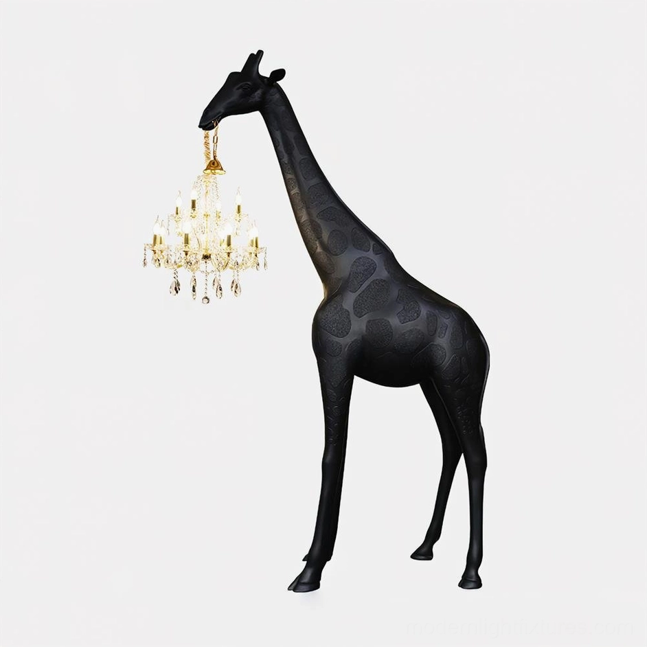 Giraffe floor lamp gold finish with black resin body and crystal chandelier in luxury modern interior