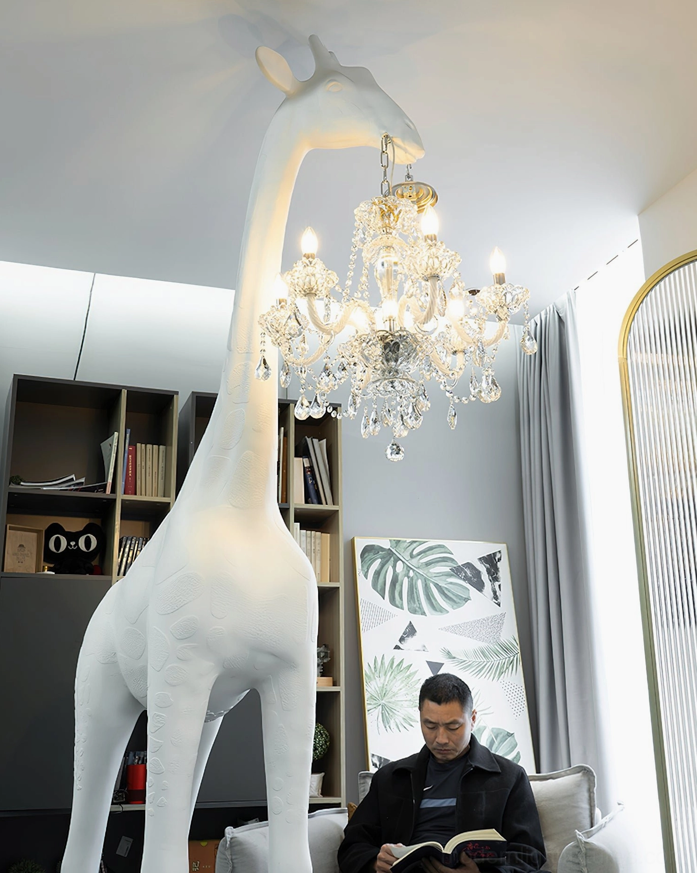 Giraffe statue floor lamp side view displaying elegant proportions and material composition of resin and crystal