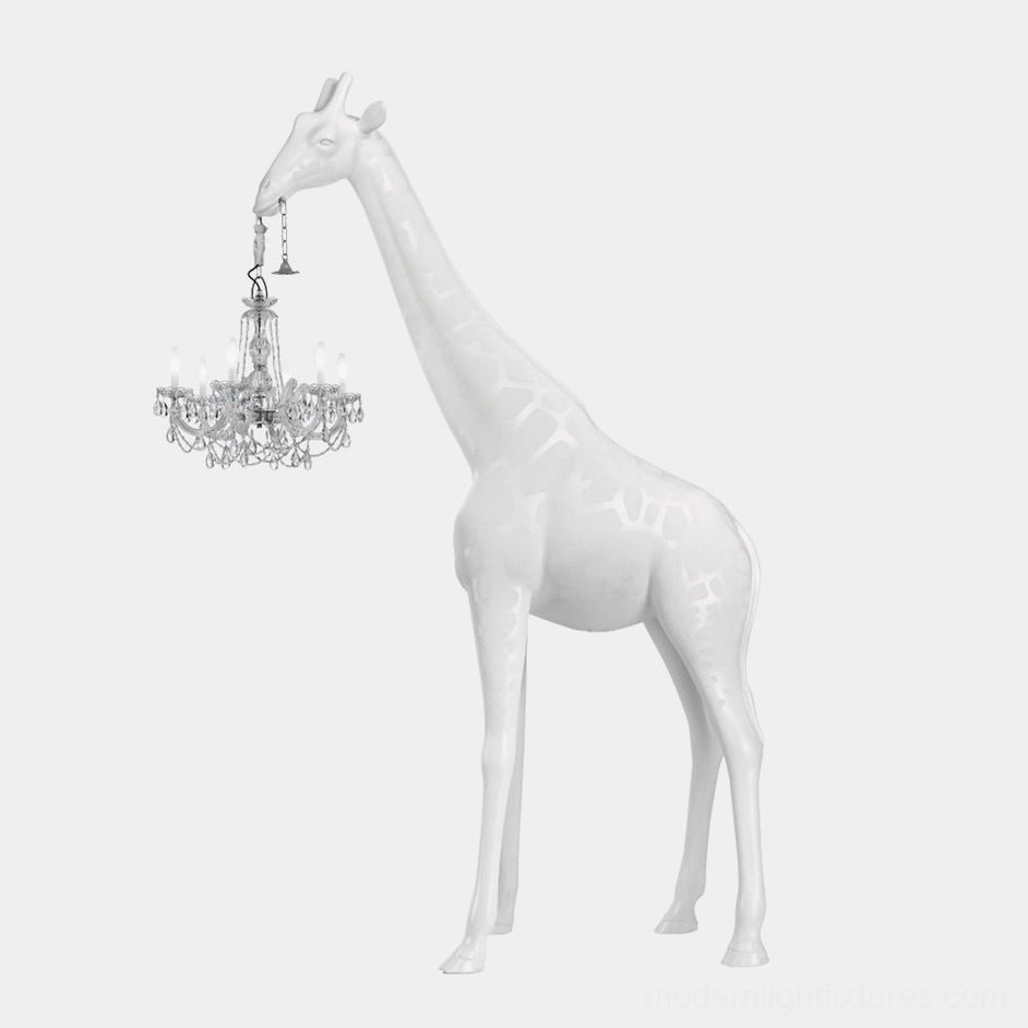 Front full-body view of white matte giraffe sculpture floor lamp with crystal chandelier, modern art lighting fixture against white studio background