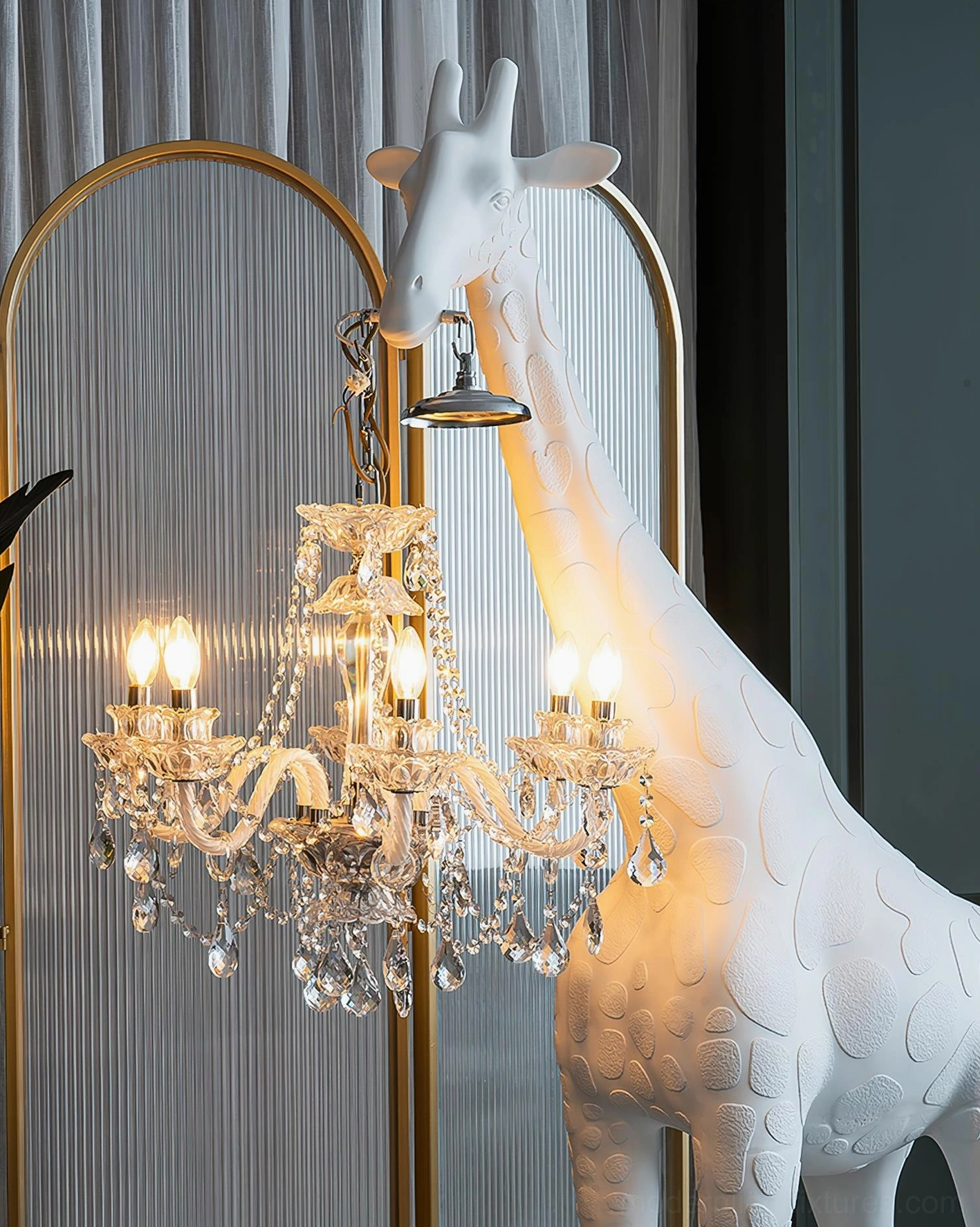 Modern giraffe statue floor lamp displayed in contemporary living room corner with gold arched mirror, warm ambient lighting