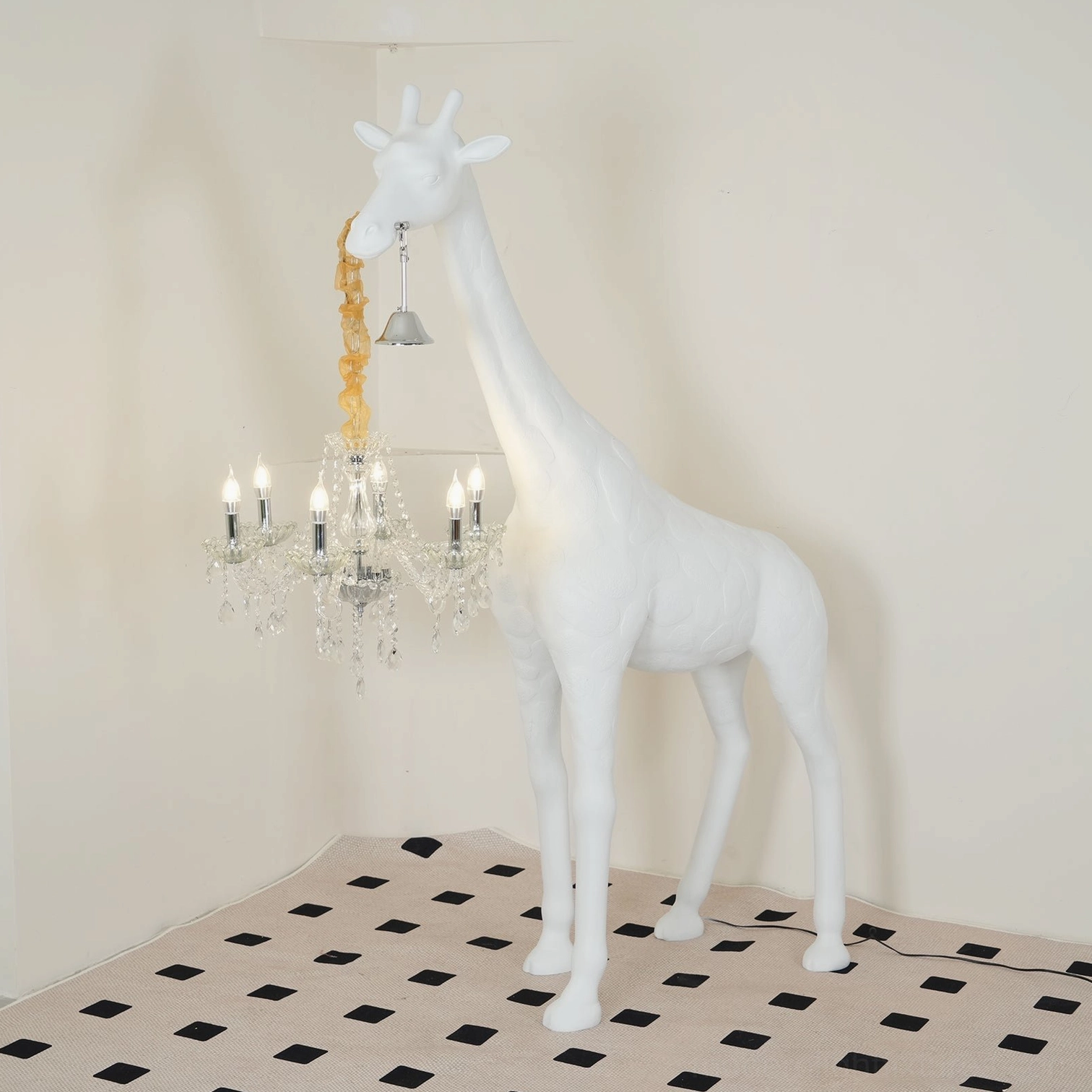 Giraffe sculpture floor lamp full-body front view featuring white matte resin body with crystal chandelier pendant