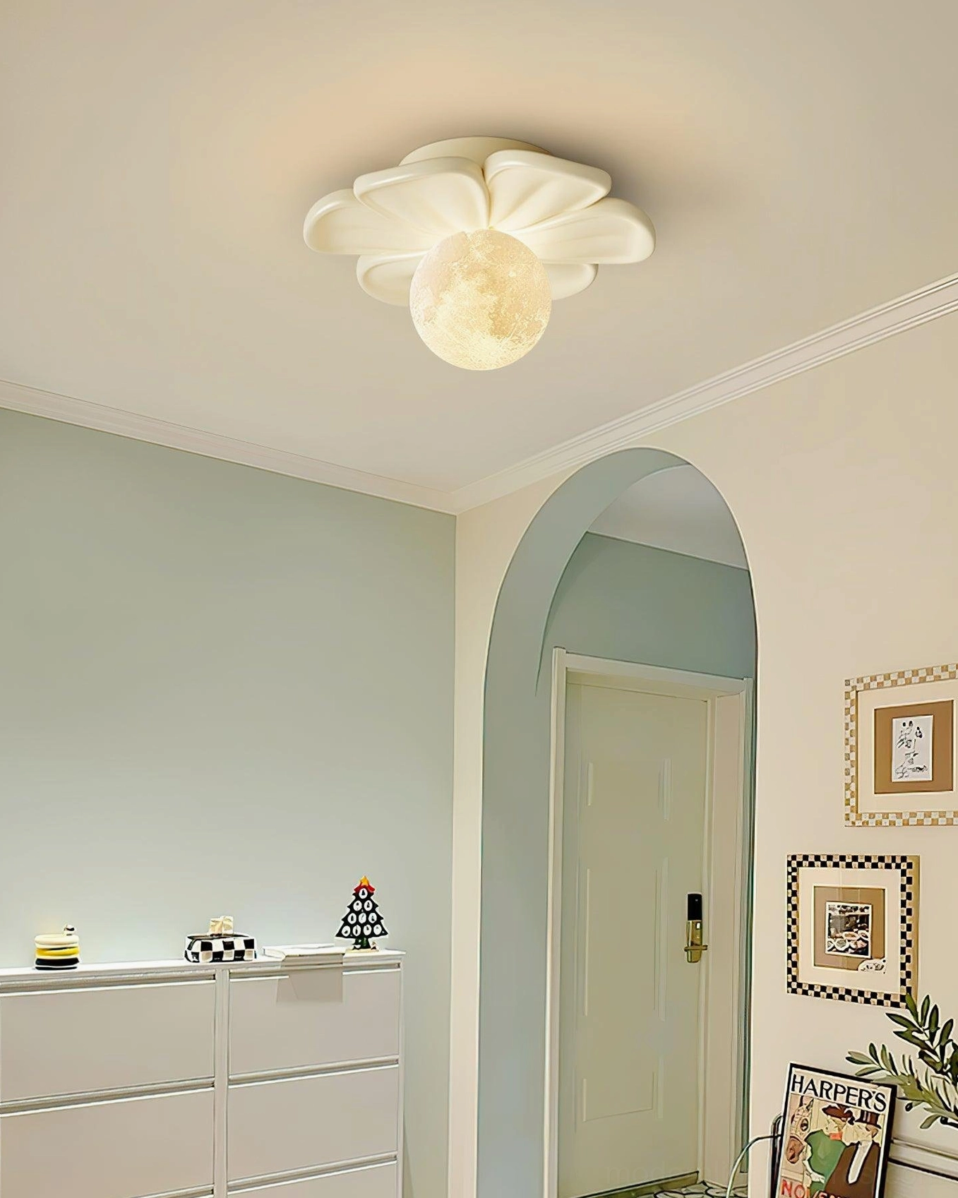 White Giulia flower ceiling light in minimalist Nordic style entryway with moon-shaped diffuser and resin petal frame