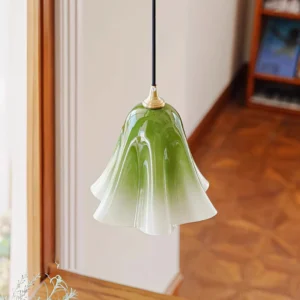Modern pendant light with ruffled glass shade in residential hallway, three-quarter interior perspective