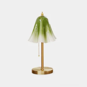 Glacea floral glass table lamp with gradient matcha green shade and brushed brass base, front view on plain studio background