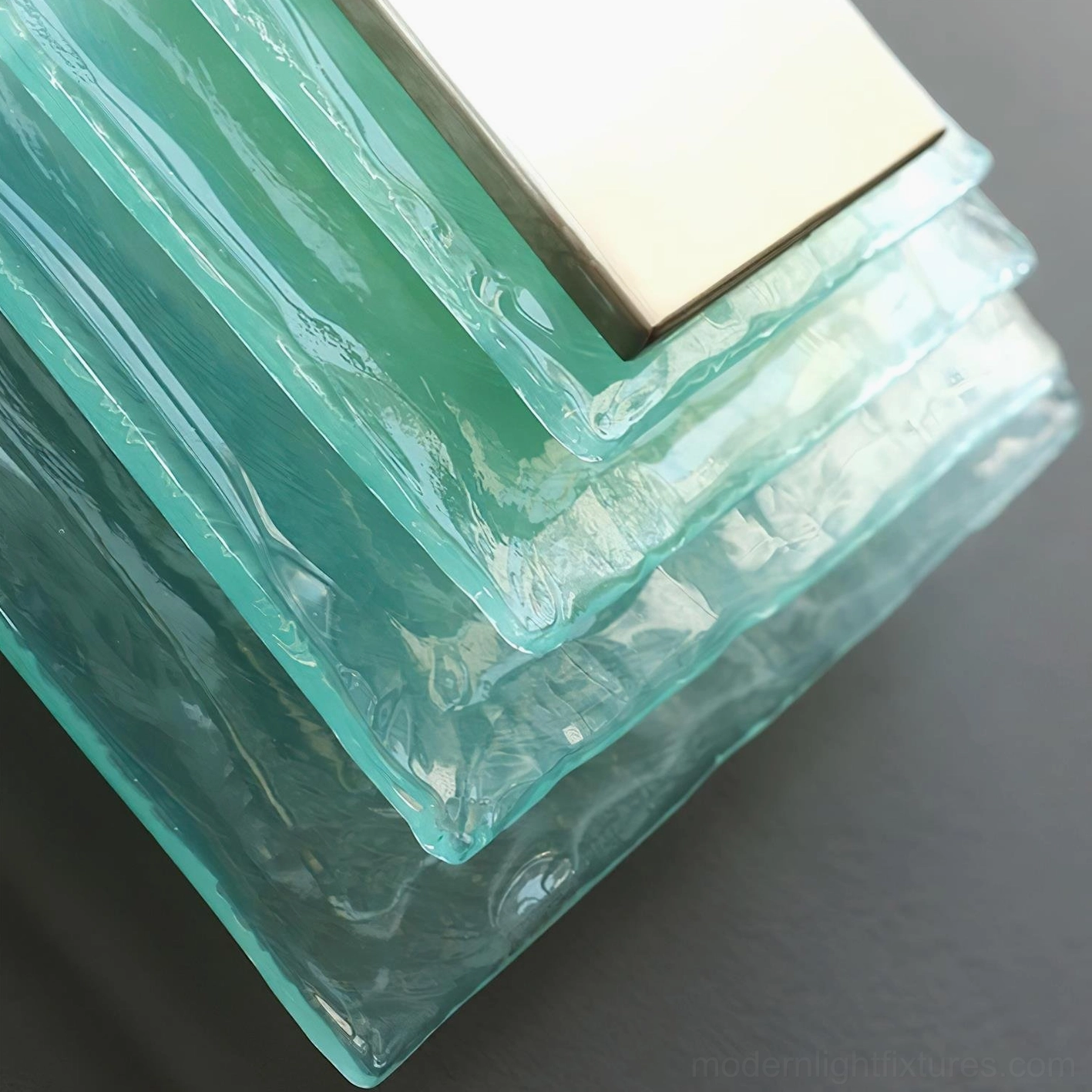 Glacira frosted glass wall sconce geometric layered design detail, modern Scandinavian inspired lighting architecture