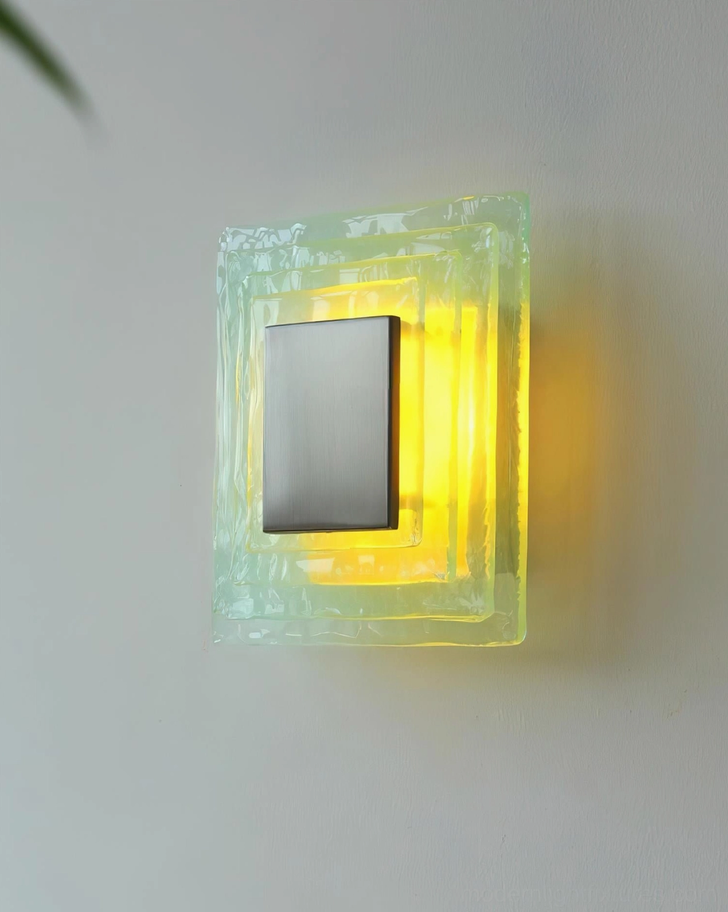 Glacira wall sconce in Scandinavian interior design, contemporary wall lighting with soft ambient glow