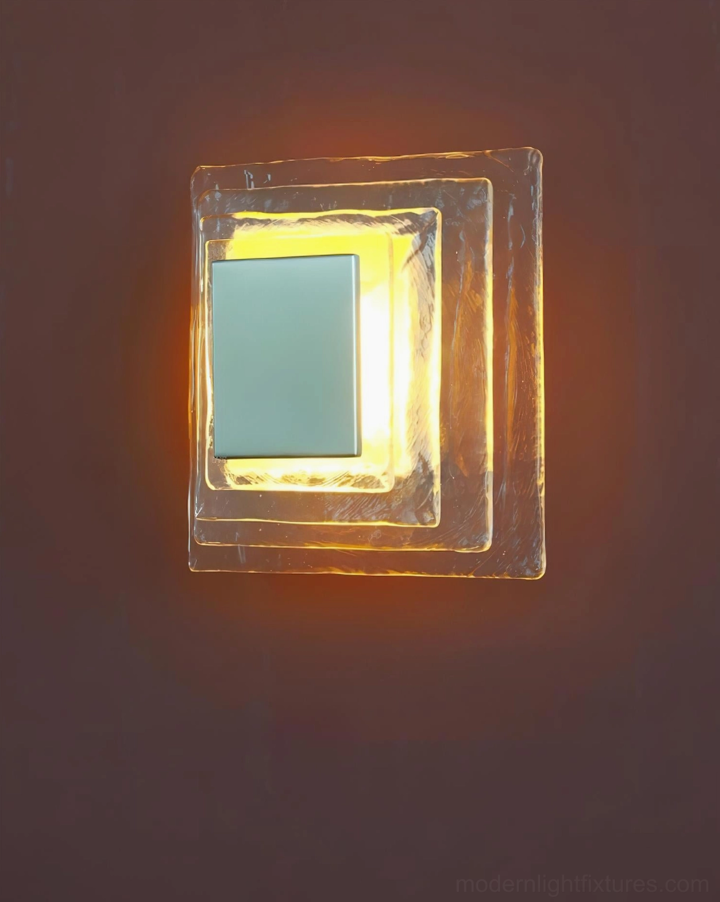 Glacira frosted glass wall sconce glowing on reddish brown wall, warm side light demonstrating ambient lighting effect