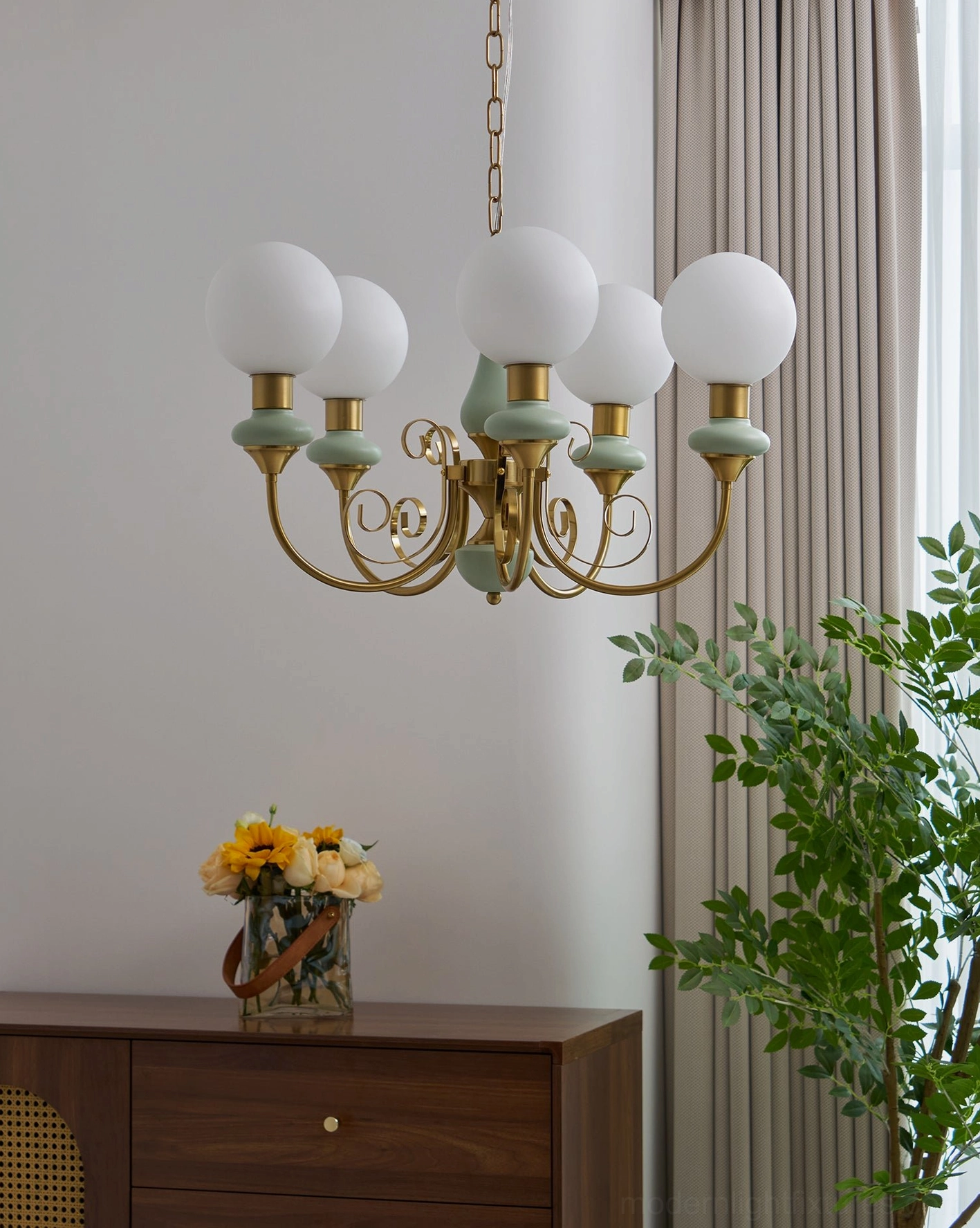 Glass chandelier with warm illuminated bulbs, frosted shade soft light diffusion