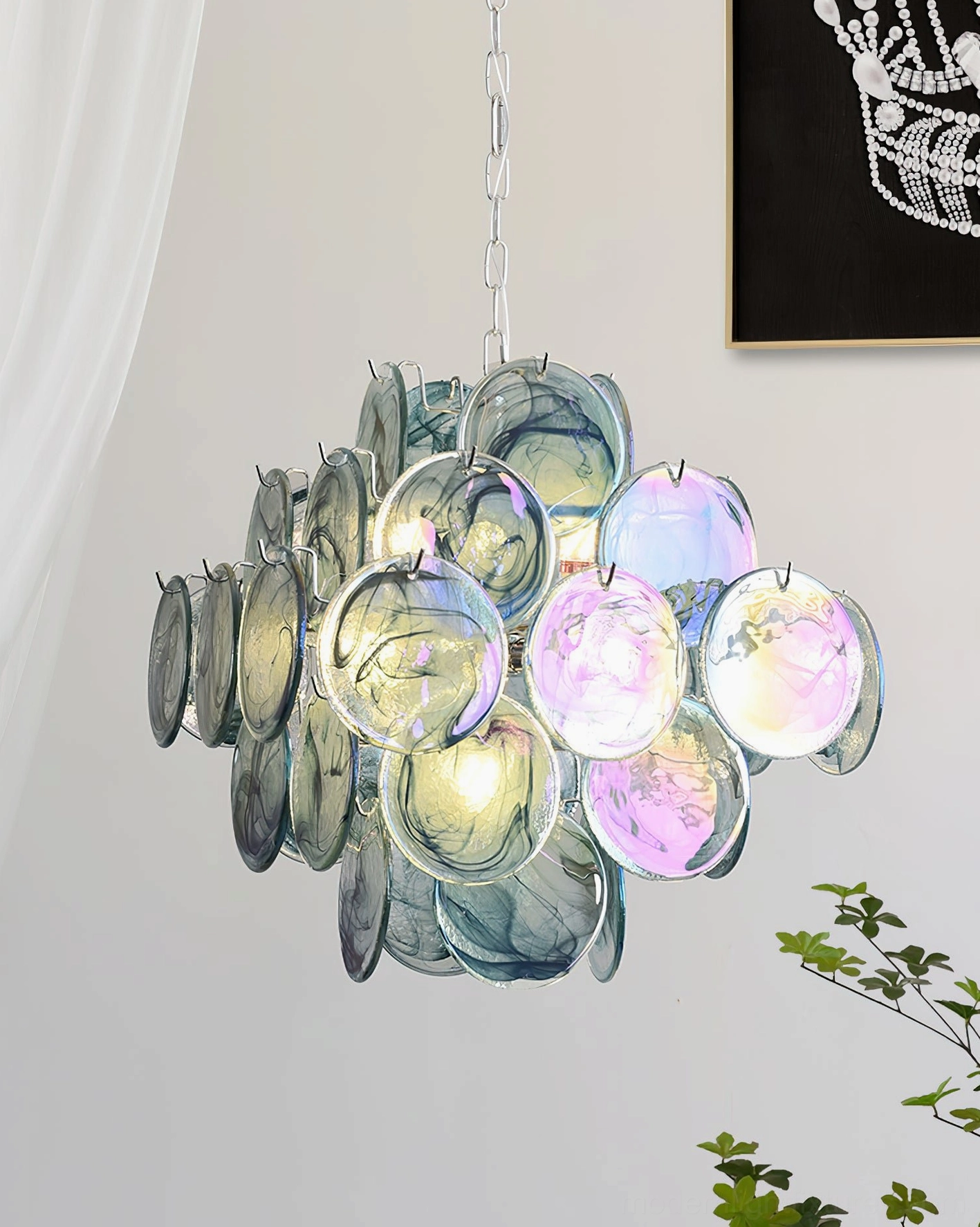 Glass disc chandelier architectural photography showing scale and proportion in elegant interior setting