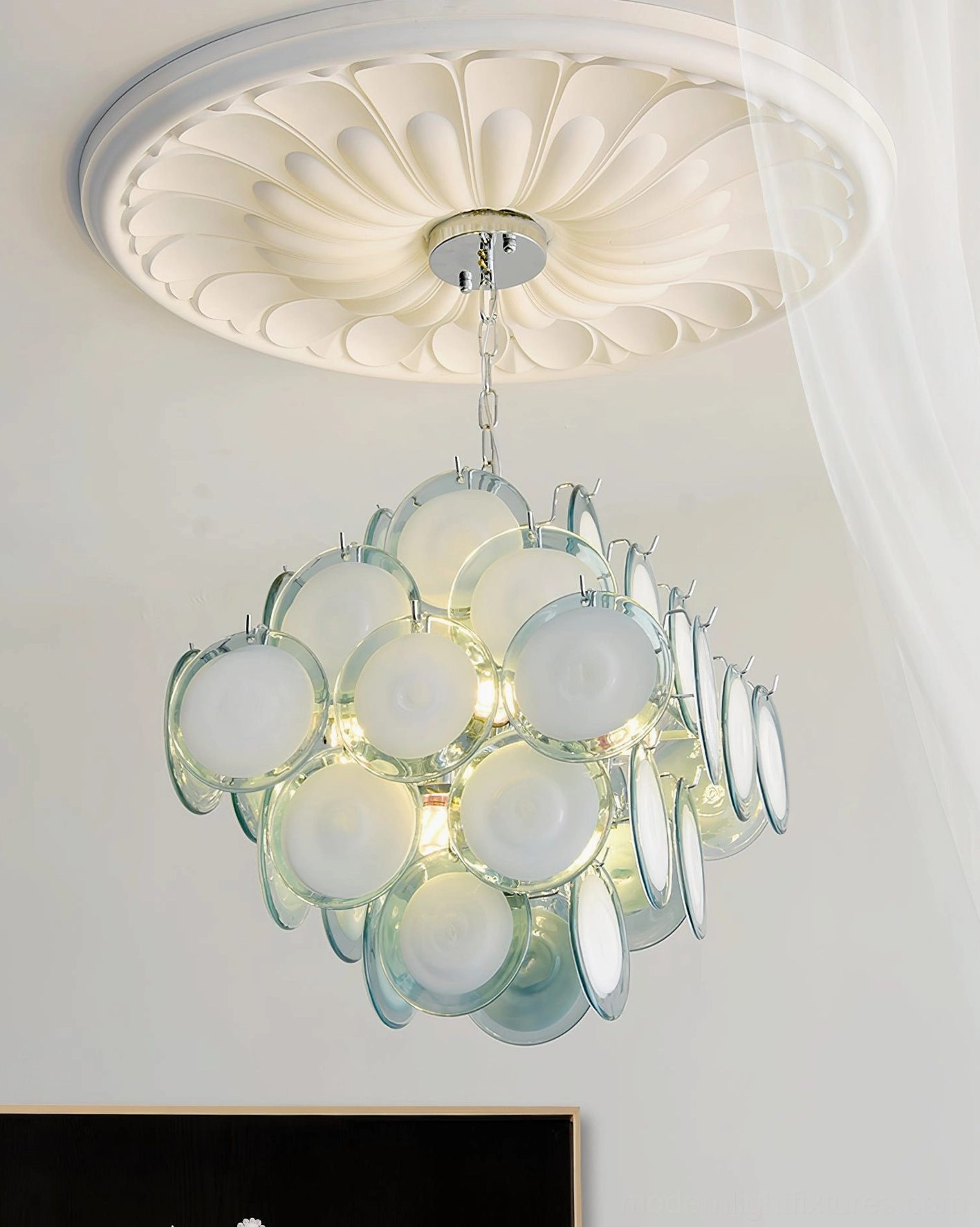 Glass disc chandelier luxury apartment interior view showing design integration with contemporary furnishings