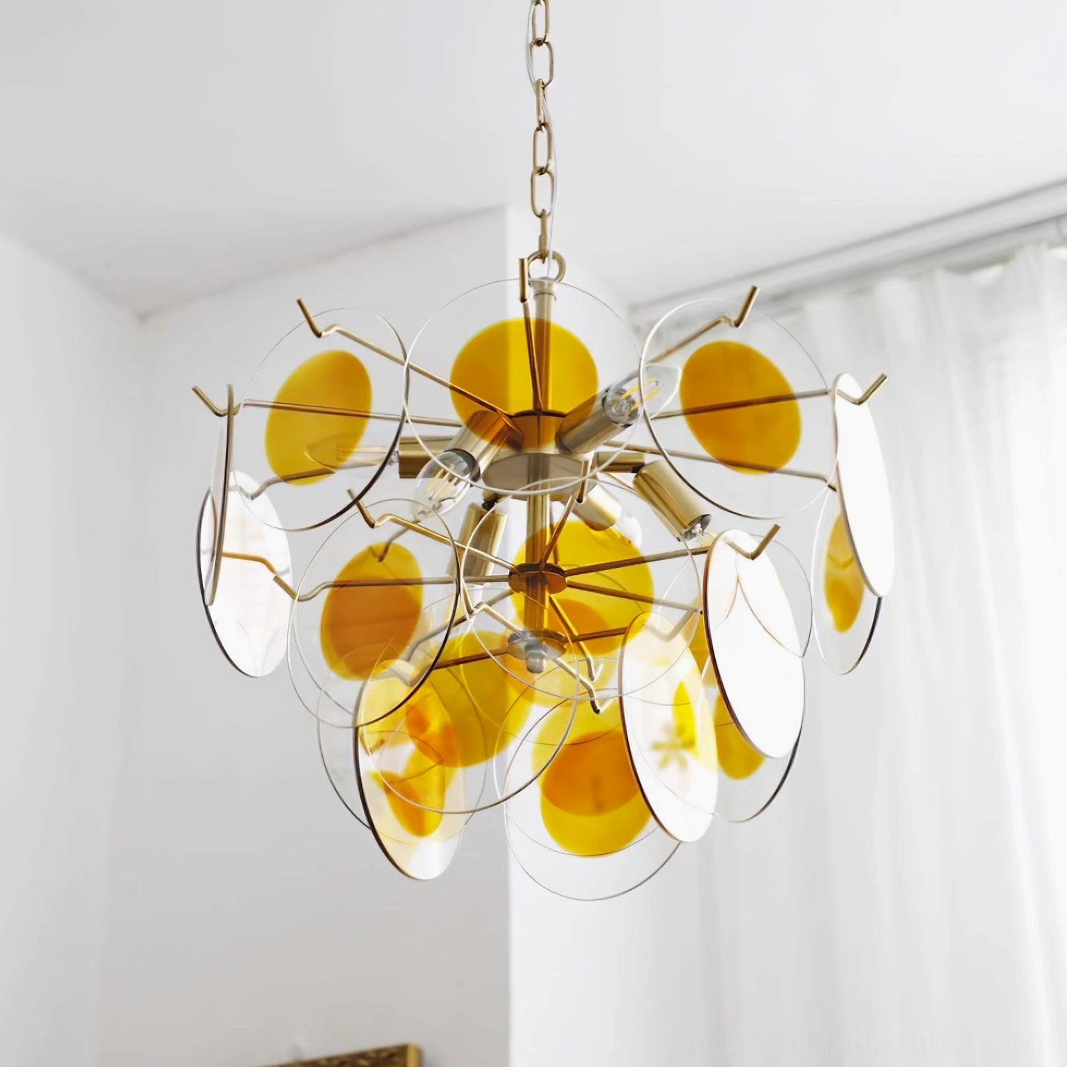 Glass disc chandelier size comparison scale reference product photography modern fixture