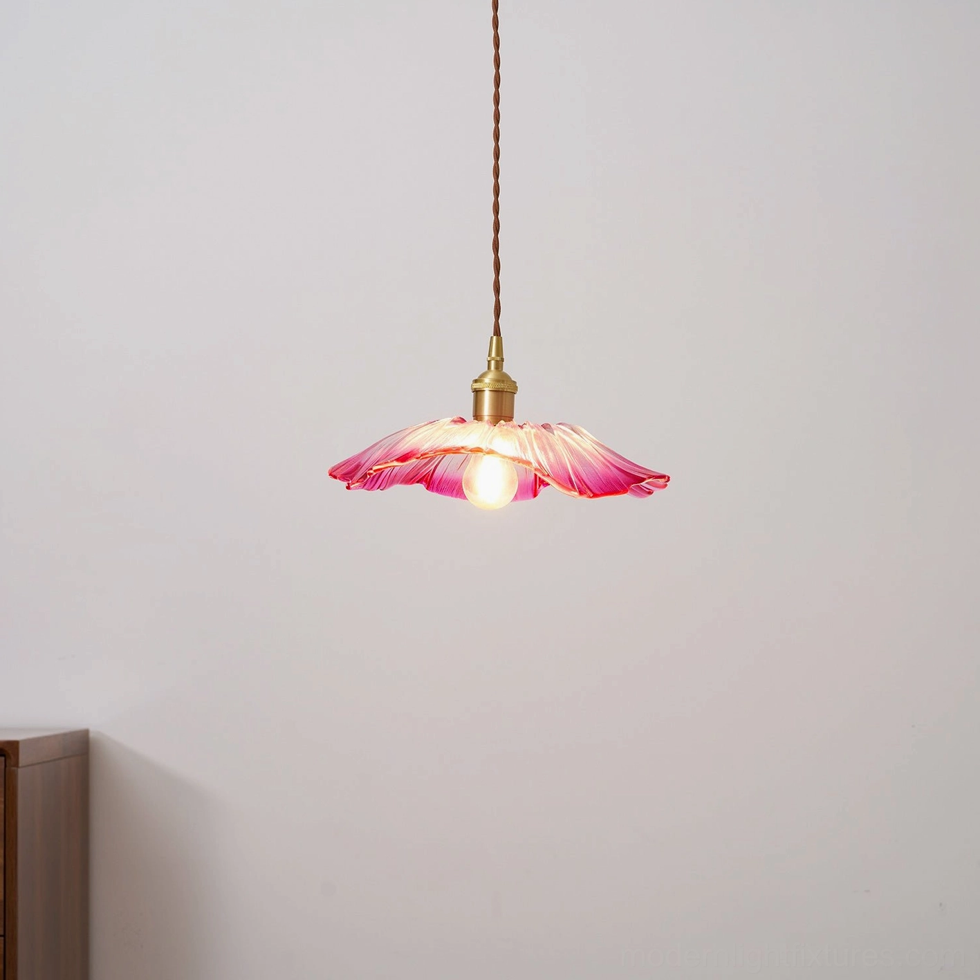 Glass flower pendant light with decorative petal shade in contemporary home styling