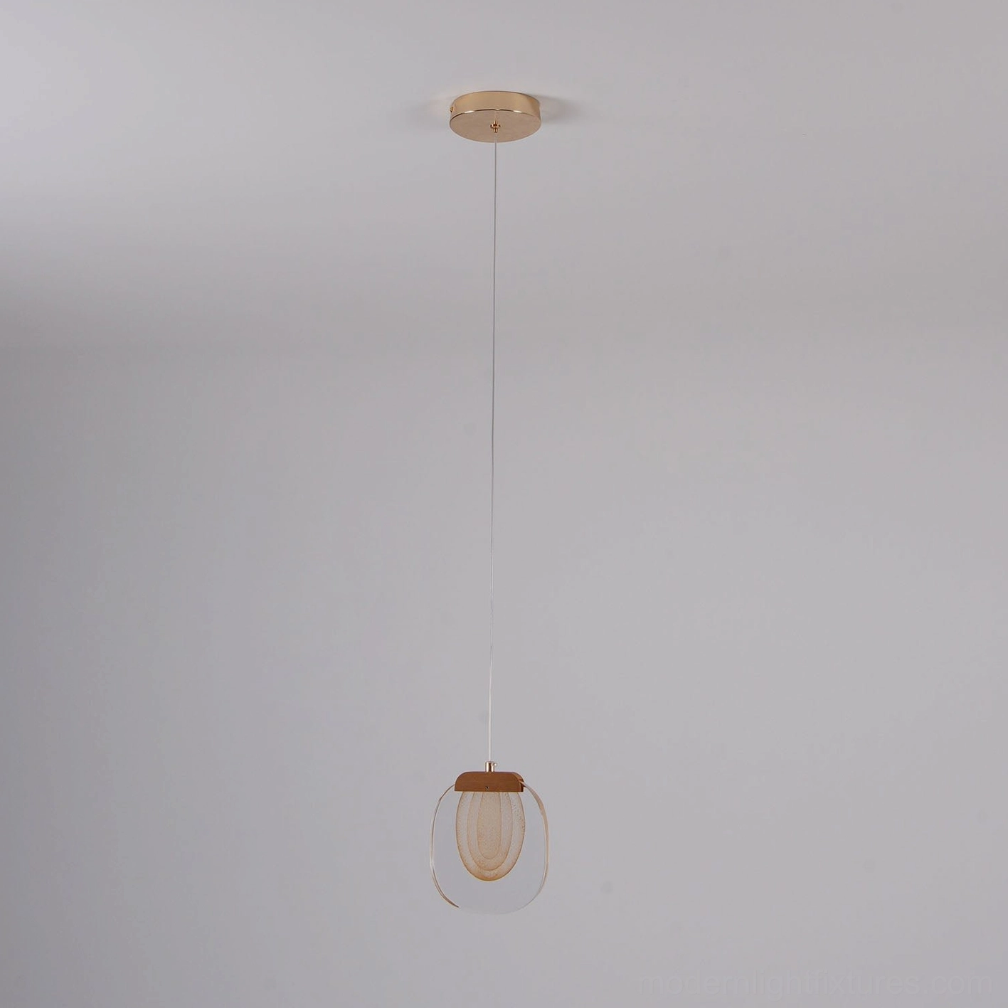 Contemporary ripples pendant light installation showing ceiling mount and adjustable cord