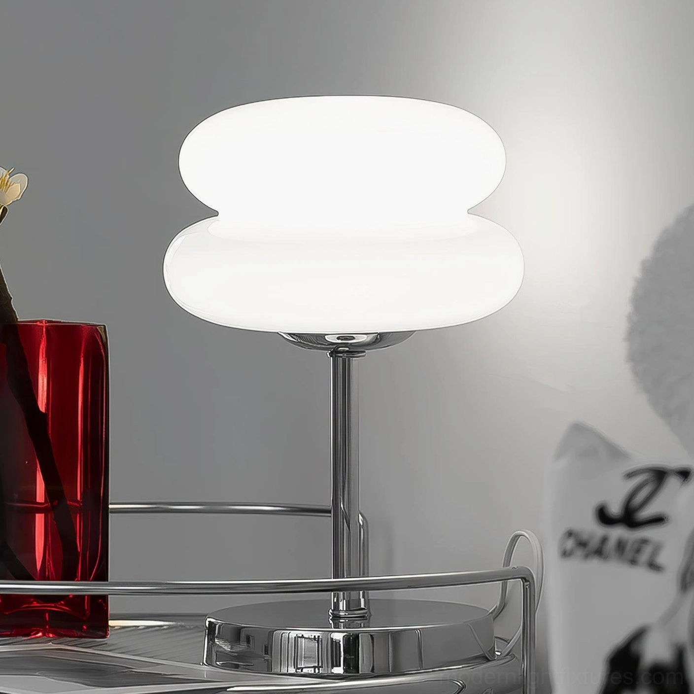 Glass table lamp with double-layer construction creating visual depth and sophistication