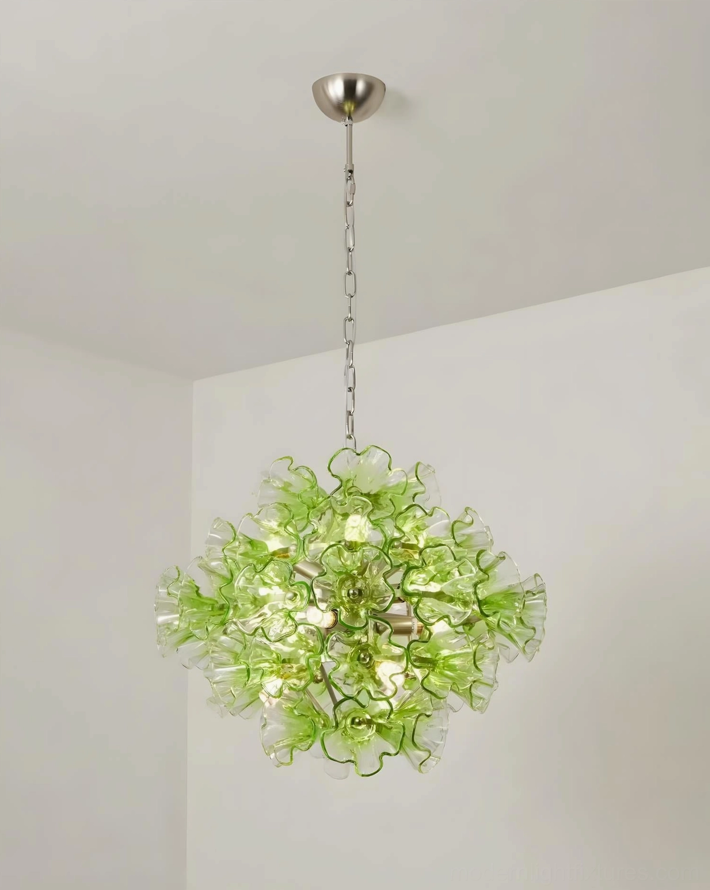 Glassia green glass pendant light fixture demonstrating interior design versatility in contemporary and bohemian styled spaces
